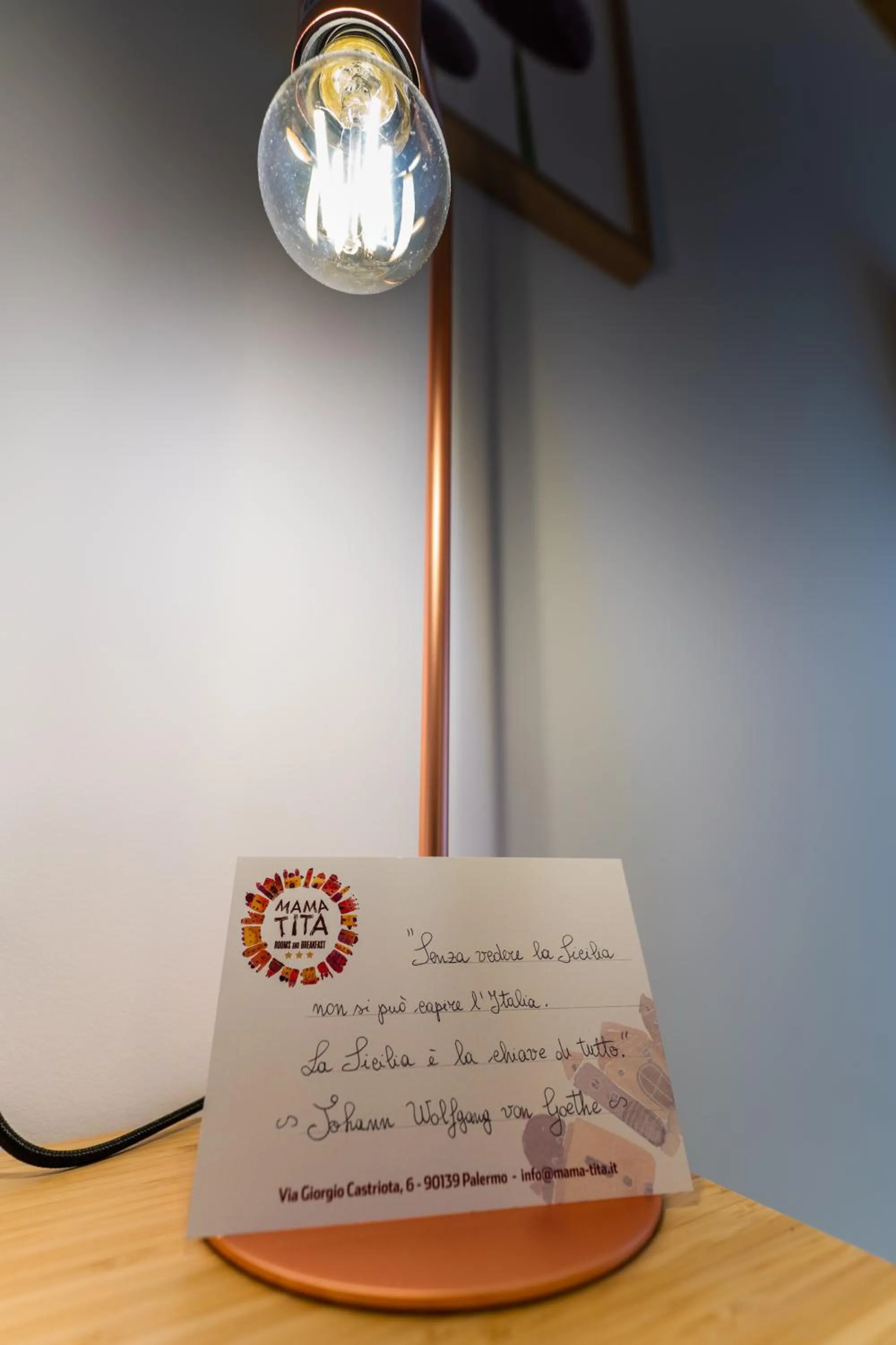 Property logo or sign in Mama Tita Rooms and Breakfast