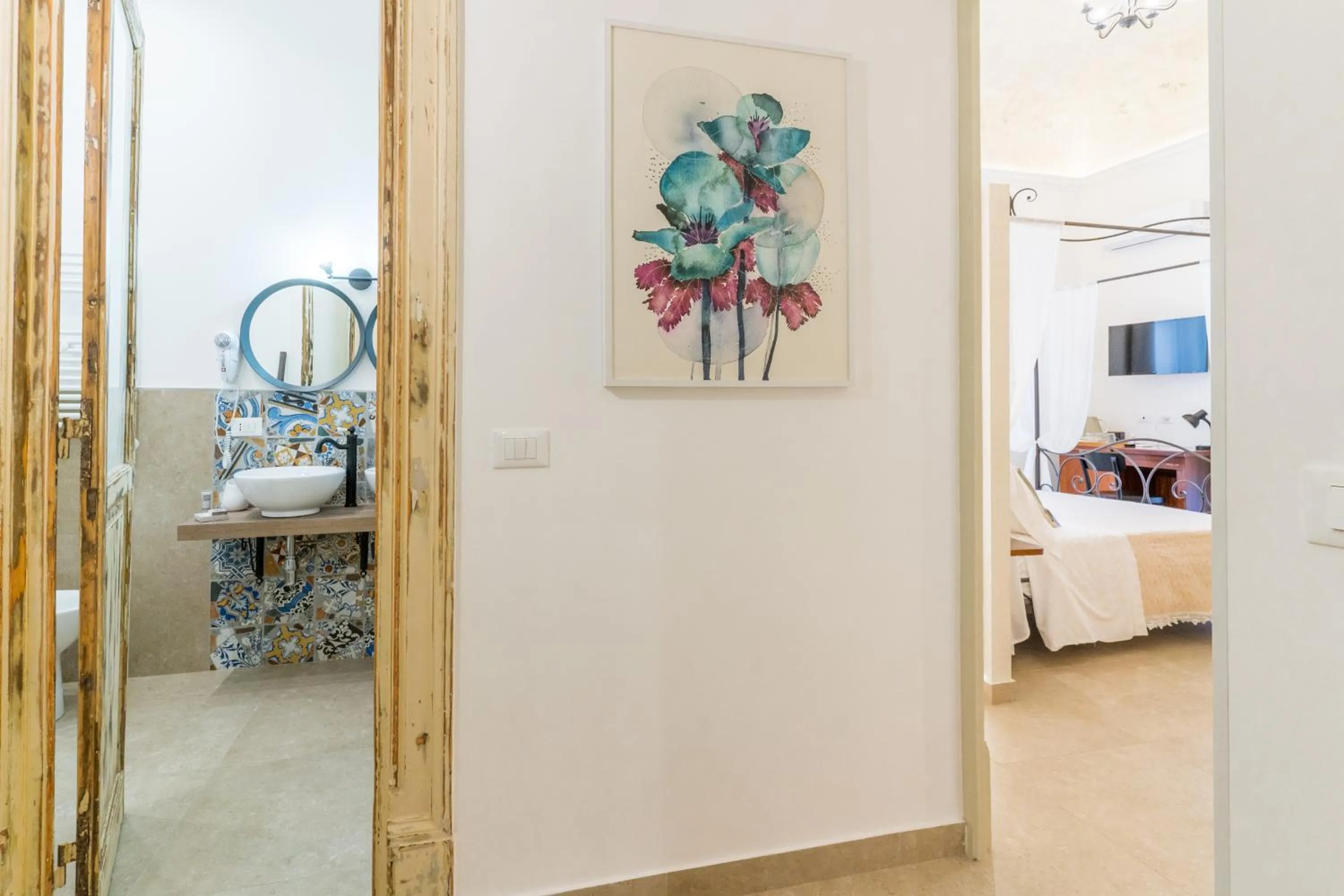 Bed in Mama Tita Rooms and Breakfast