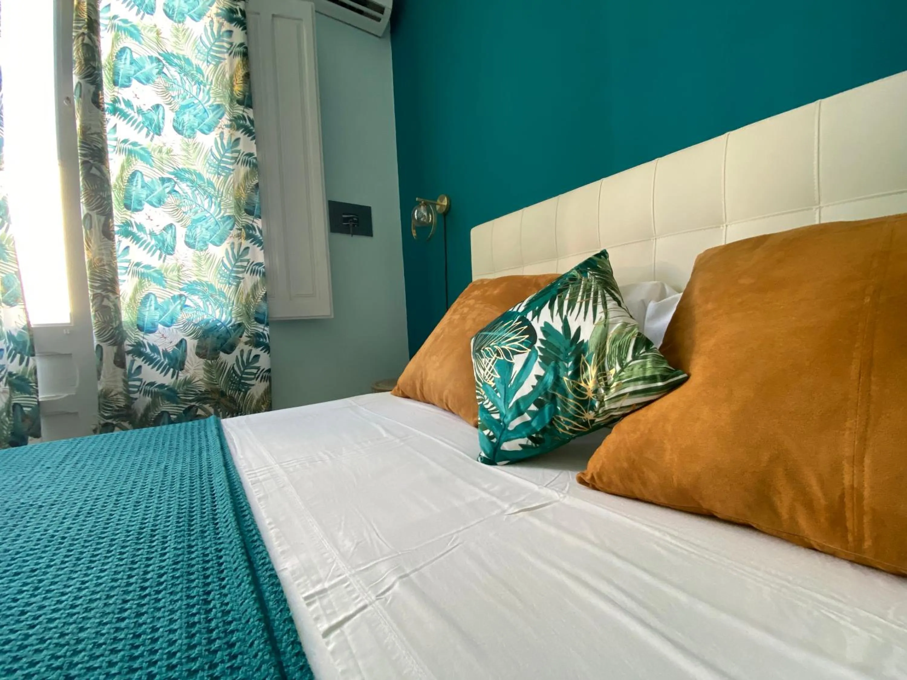 Bed in AFFITTACAMERE PIAZZA MAMELI