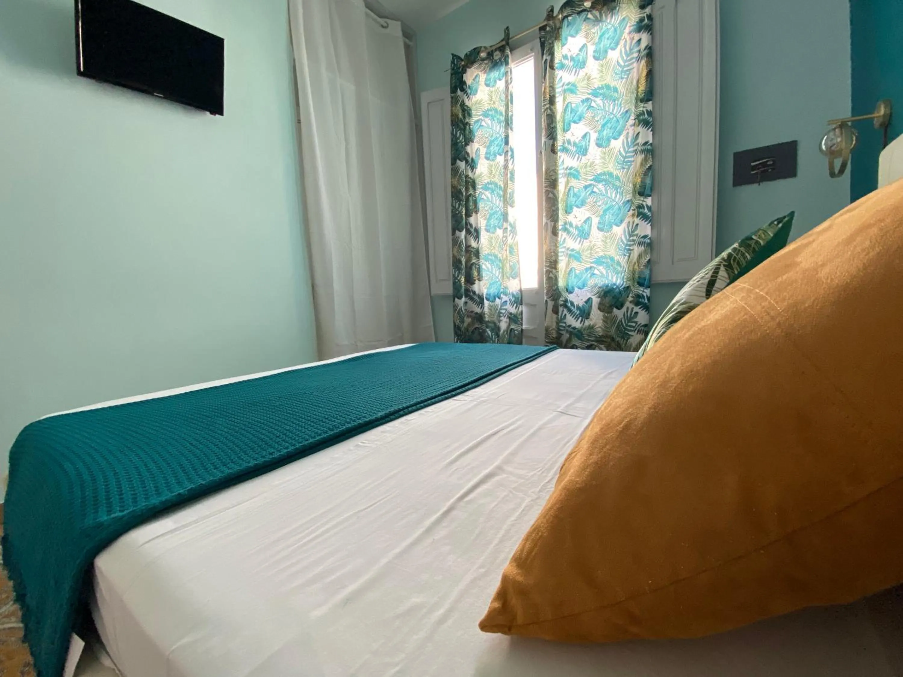 Bed in AFFITTACAMERE PIAZZA MAMELI