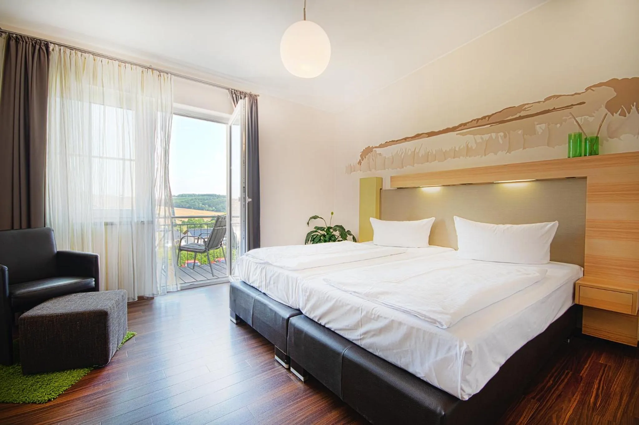 Photo of the whole room, Bed in Brauers Landarthotel GmbH