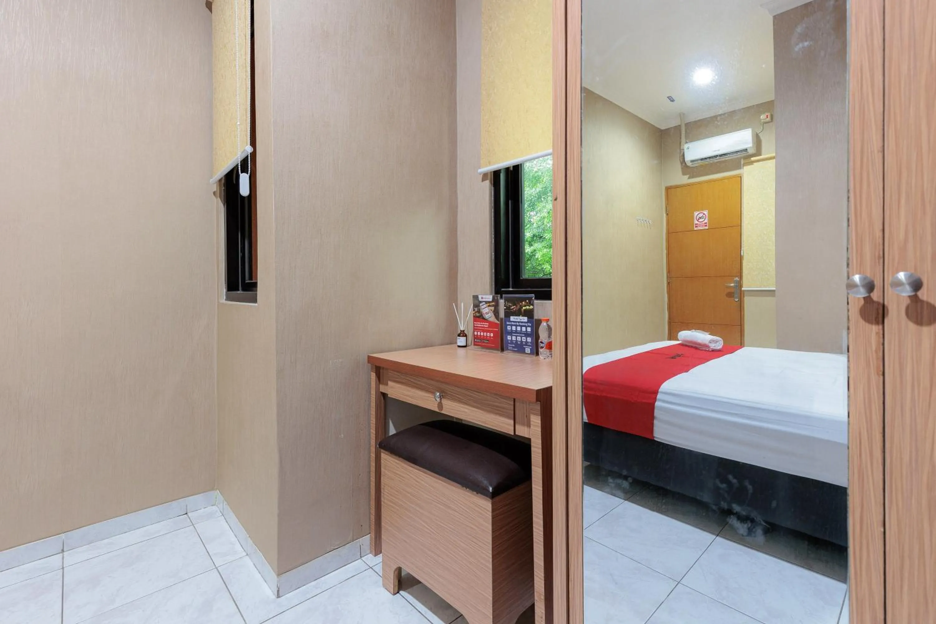 Bedroom, Bed in RedDoorz Syariah at Hotel Tiga ER near Karawang Central Plaza