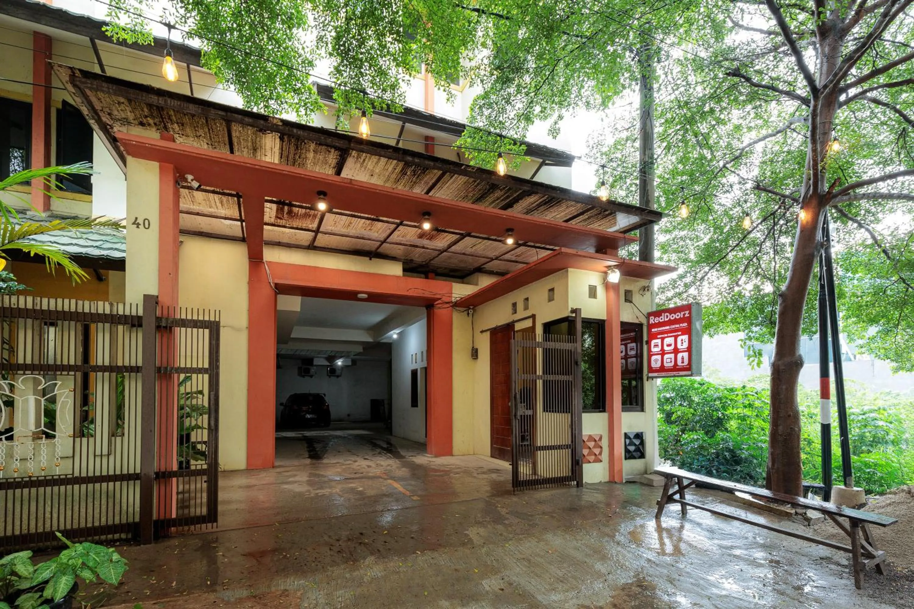 Facade/entrance in RedDoorz Syariah at Hotel Tiga ER near Karawang Central Plaza