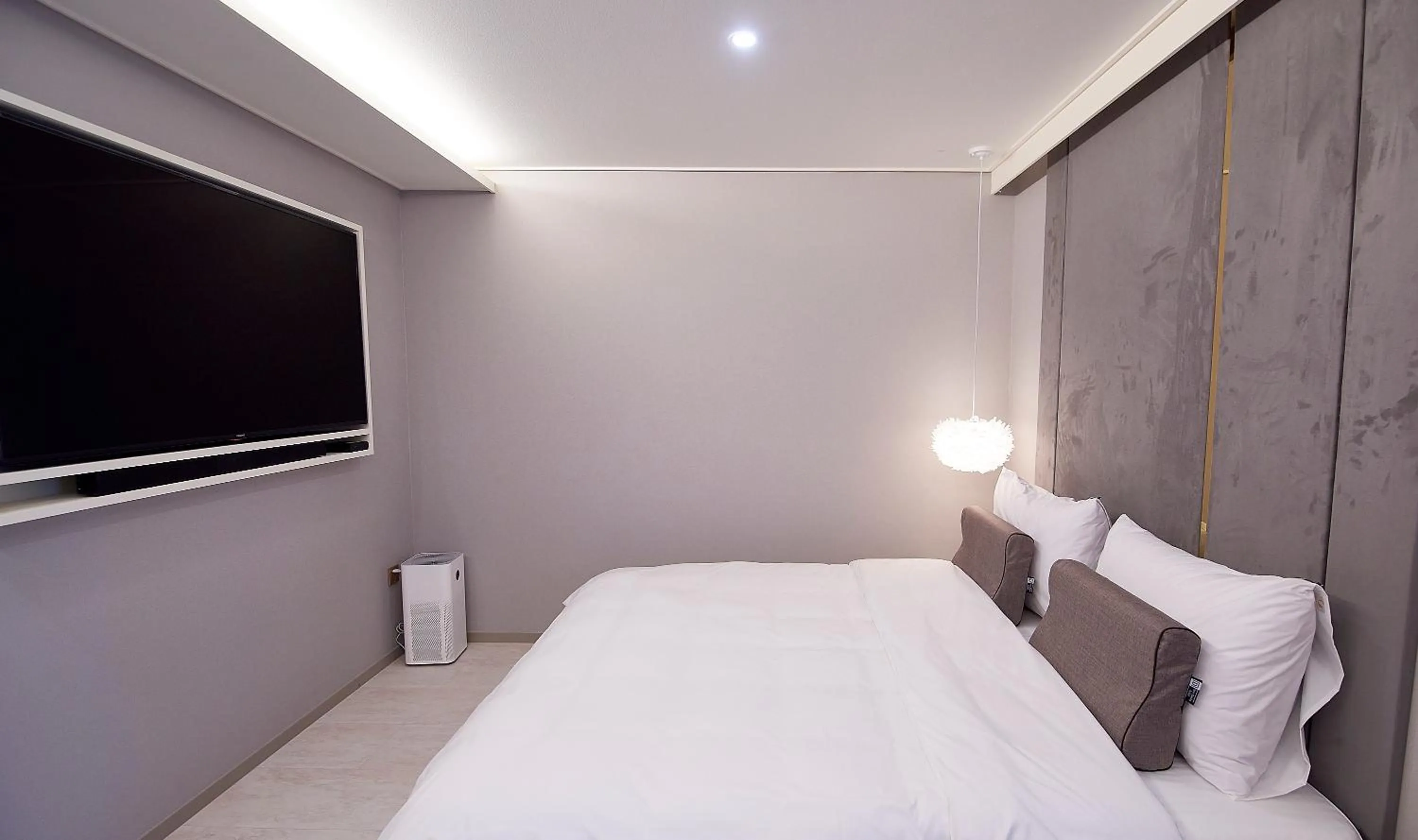 Bed in 사직 덴바스타 시그니처 호텔