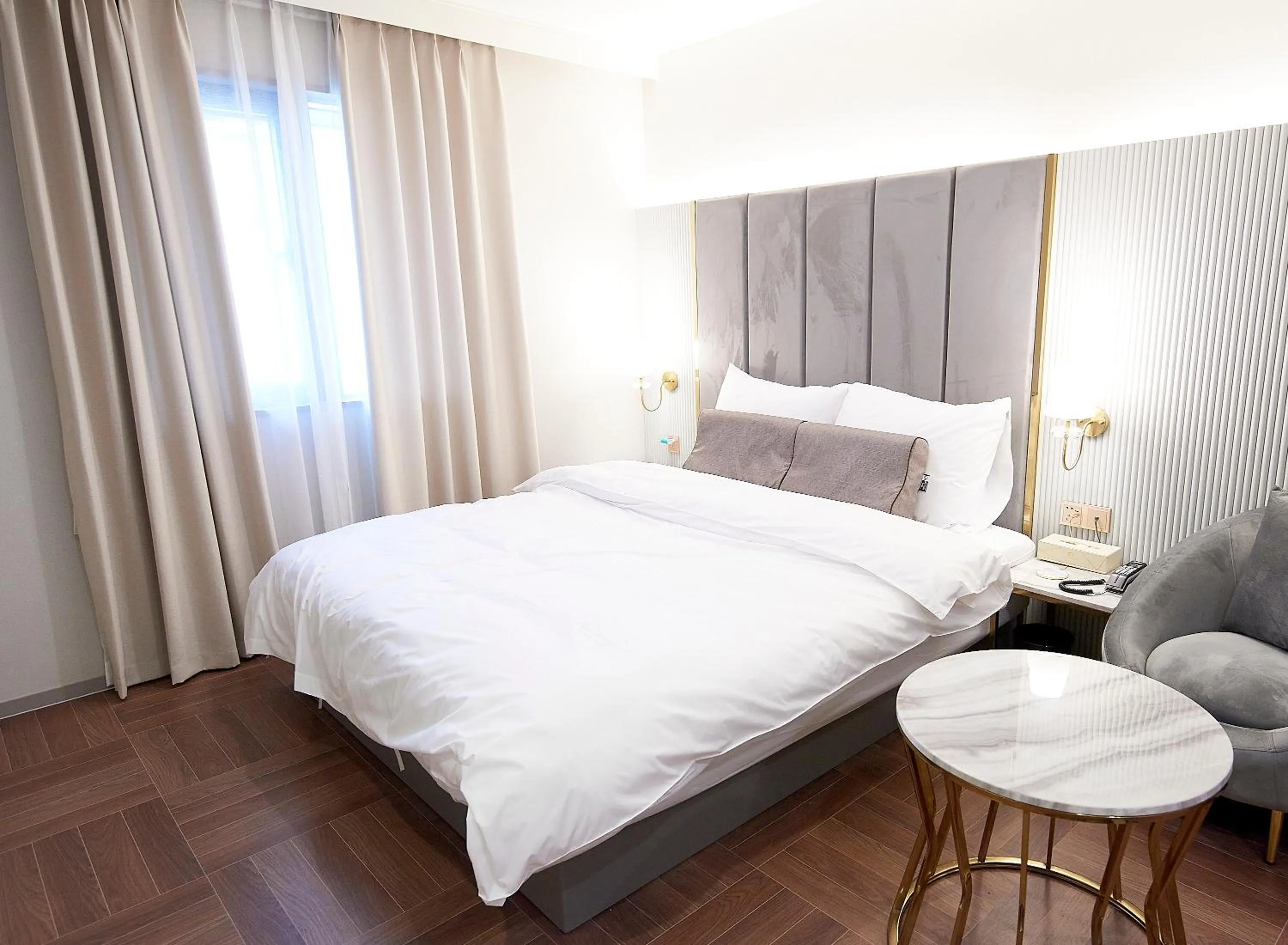 Bed in 사직 덴바스타 시그니처 호텔