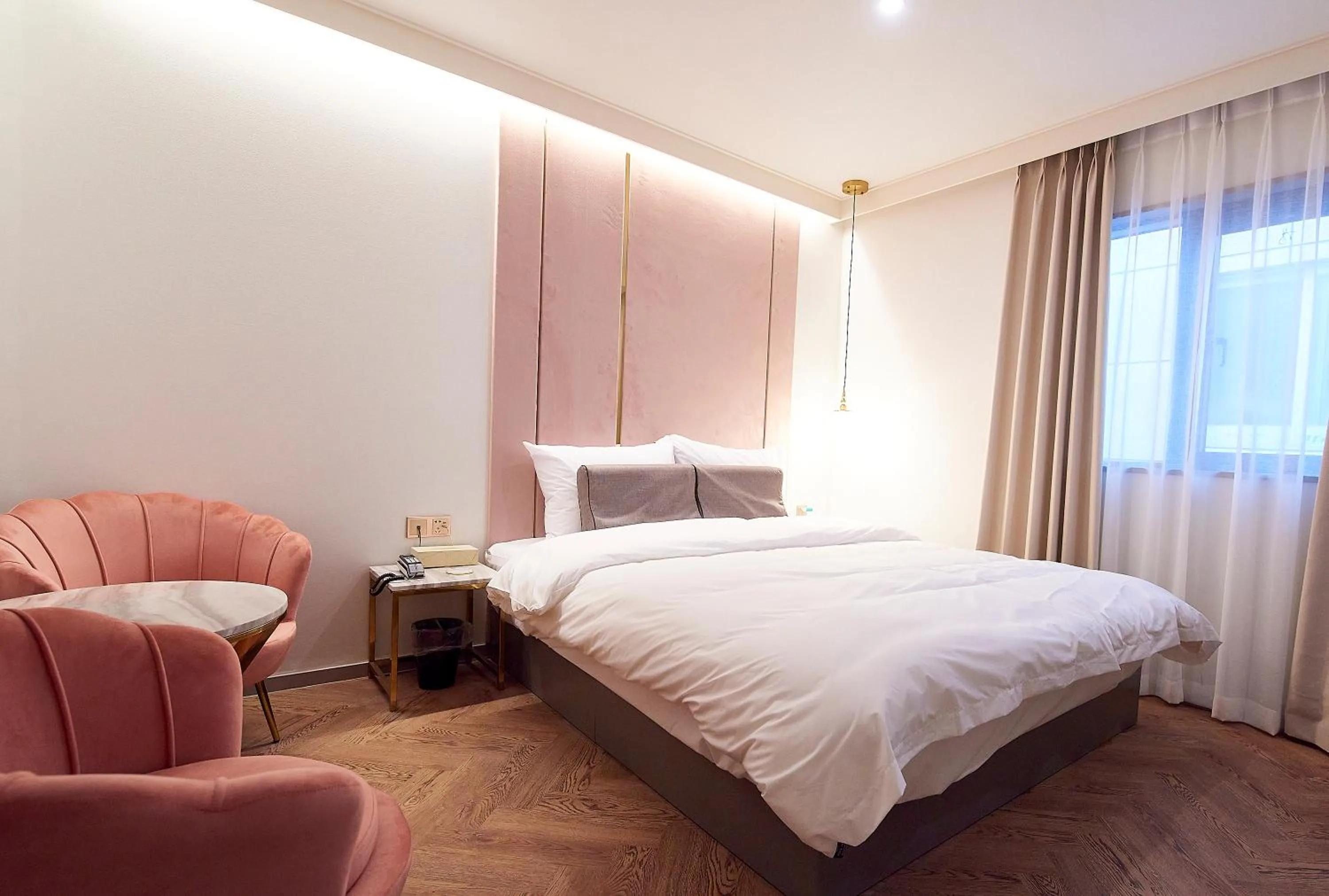 Bed in 사직 덴바스타 시그니처 호텔