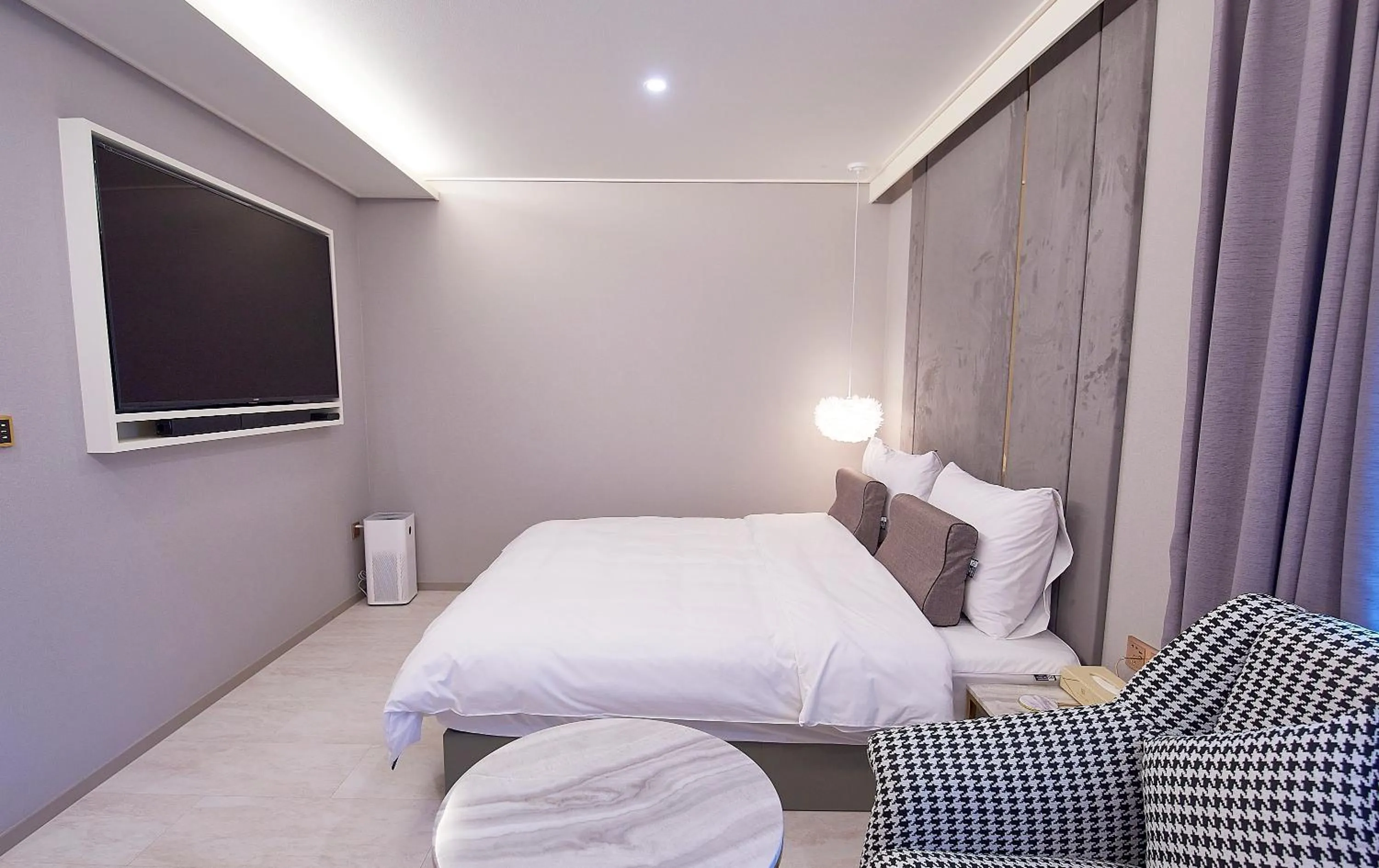 Bed in 사직 덴바스타 시그니처 호텔