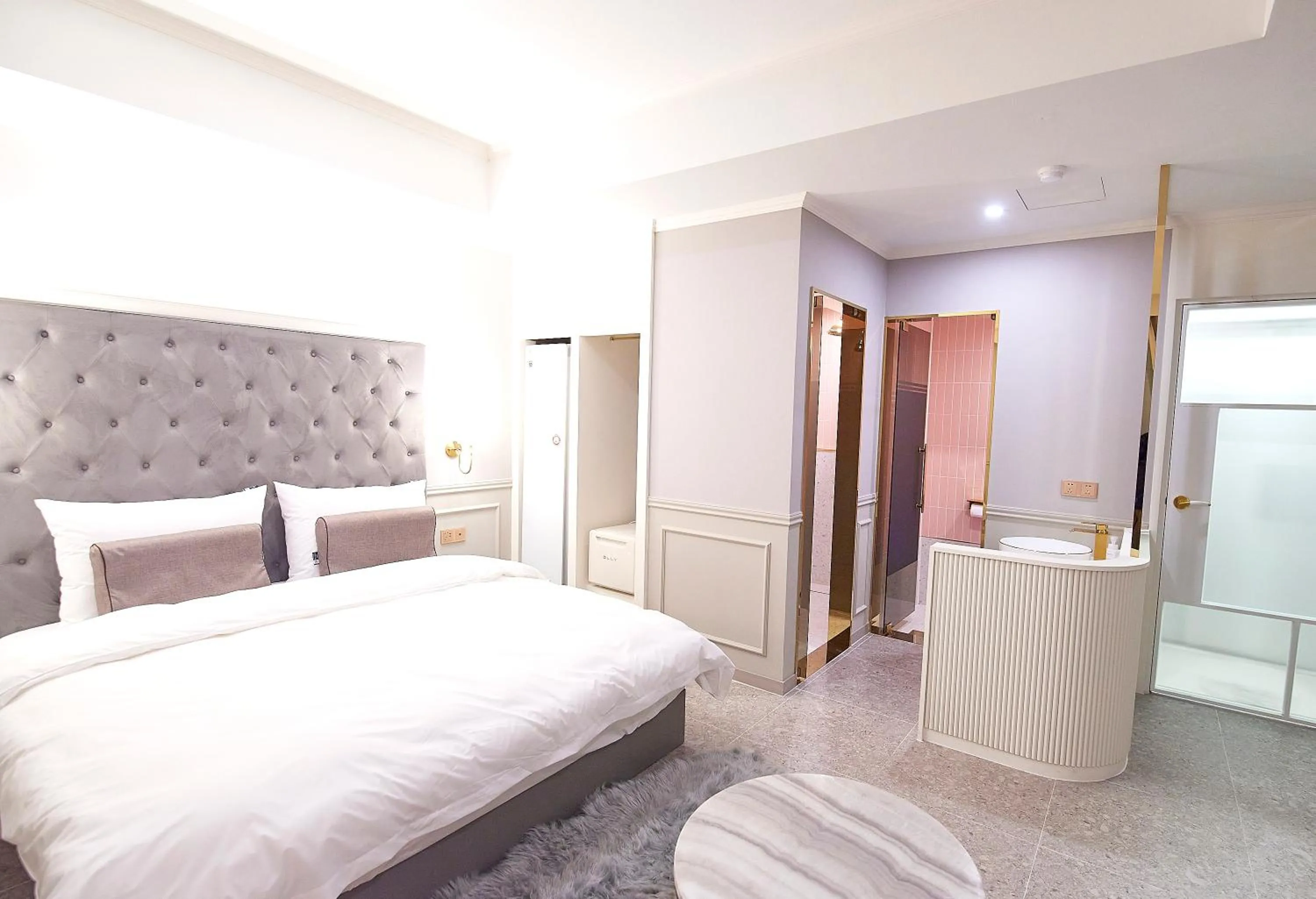 Bed in 사직 덴바스타 시그니처 호텔