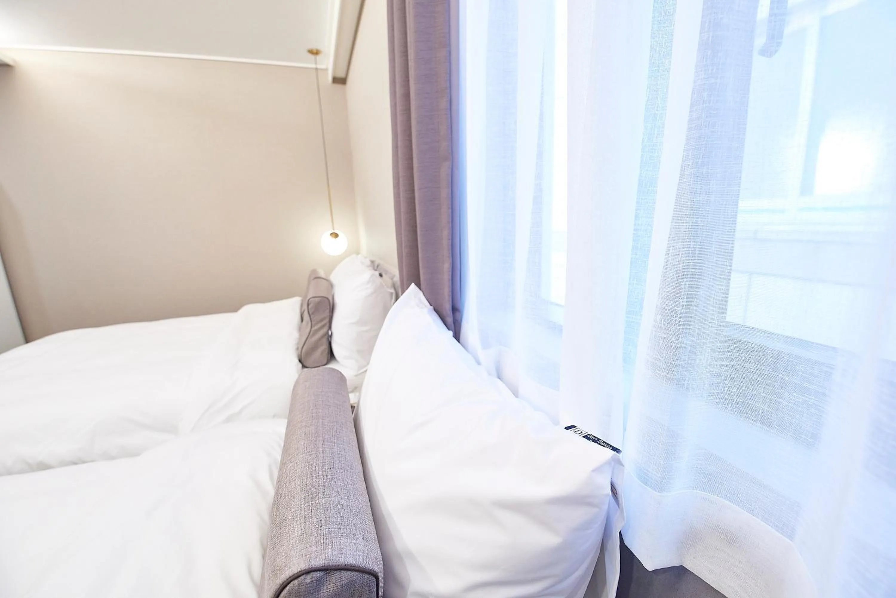 Bed in 사직 덴바스타 시그니처 호텔