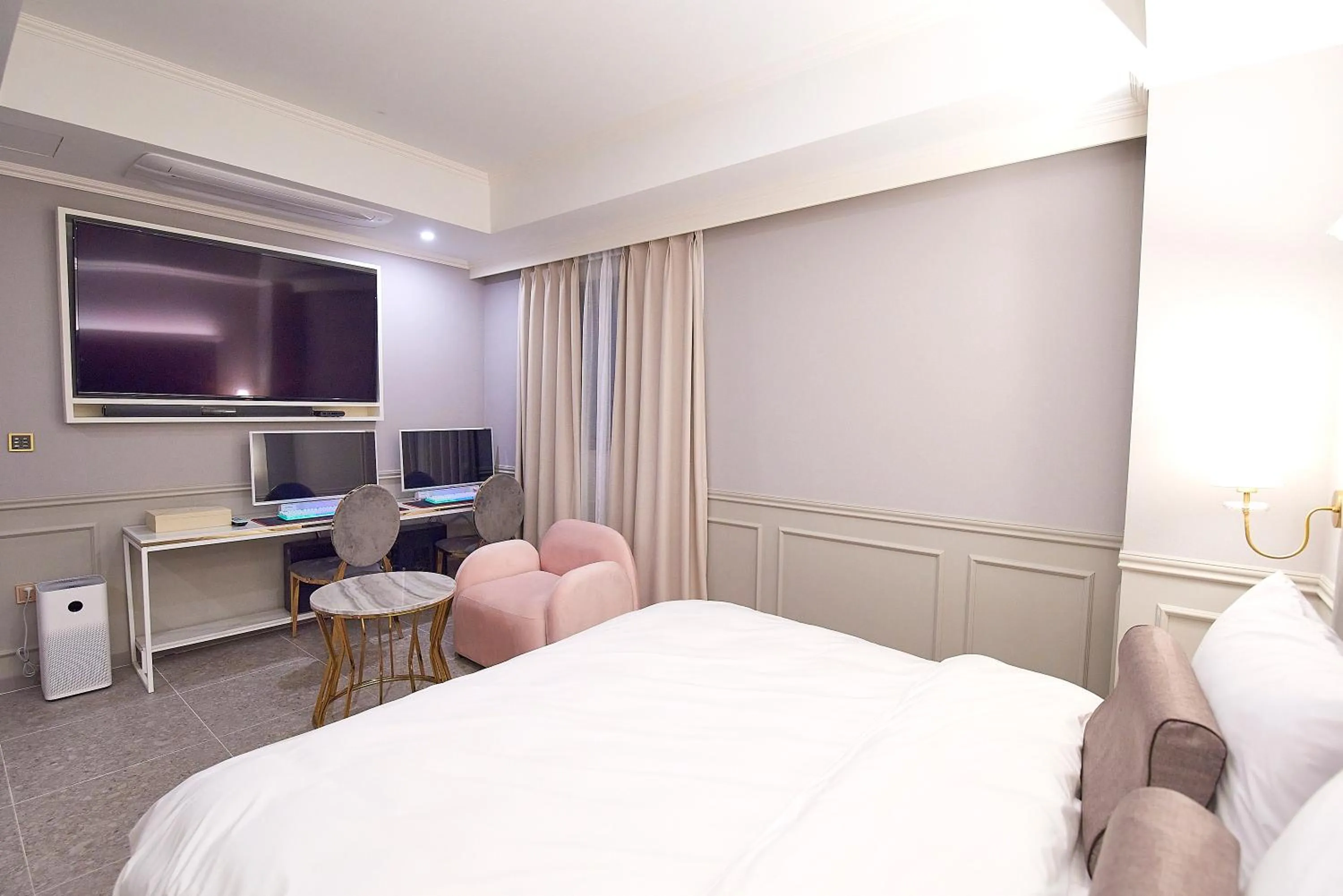 Bed in 사직 덴바스타 시그니처 호텔