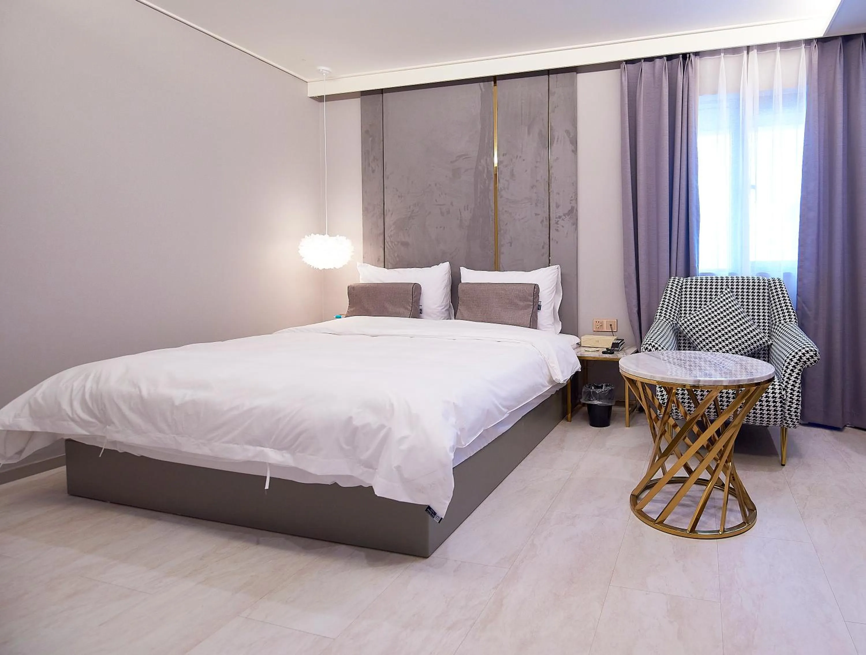 Bed in 사직 덴바스타 시그니처 호텔