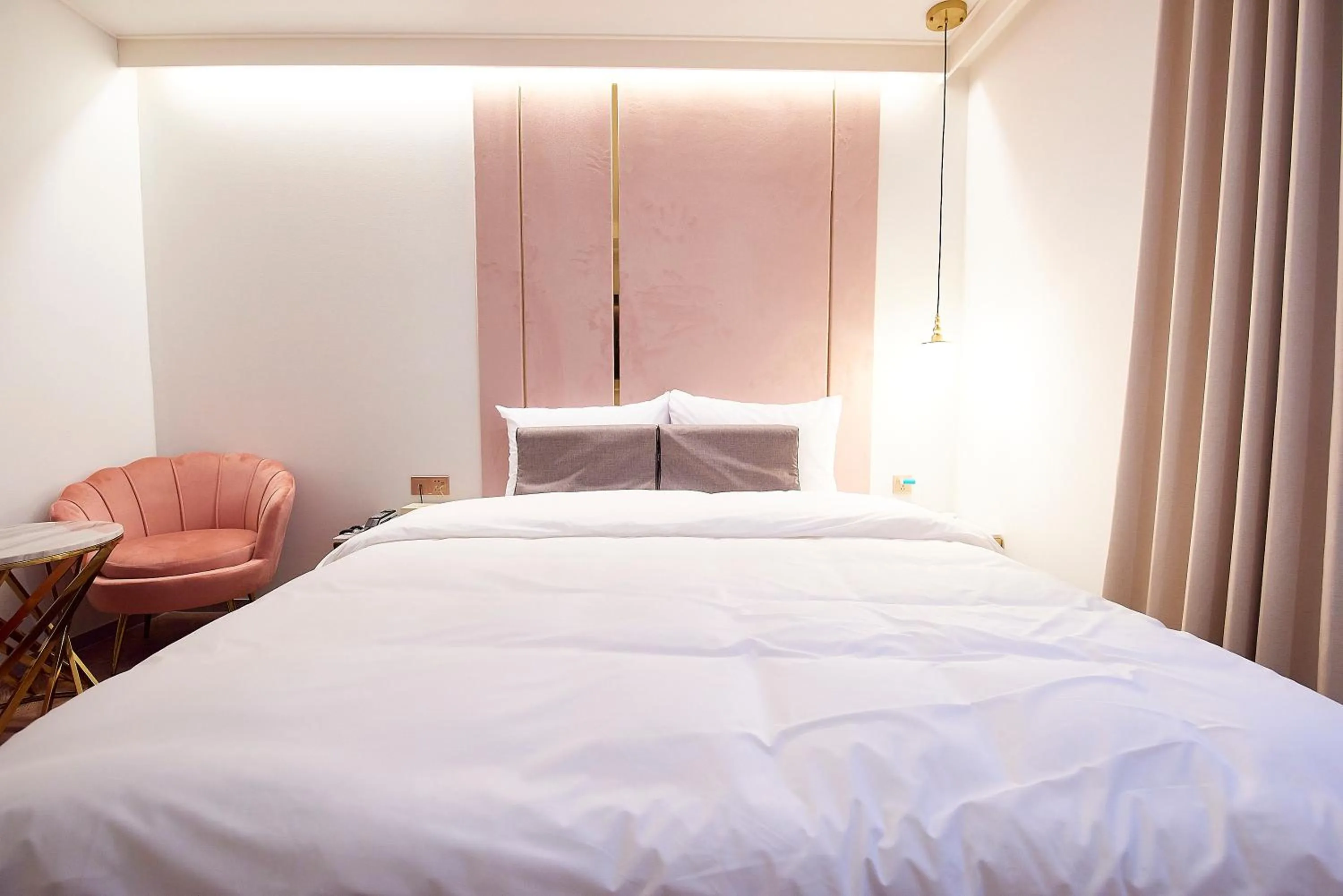 Bed in 사직 덴바스타 시그니처 호텔