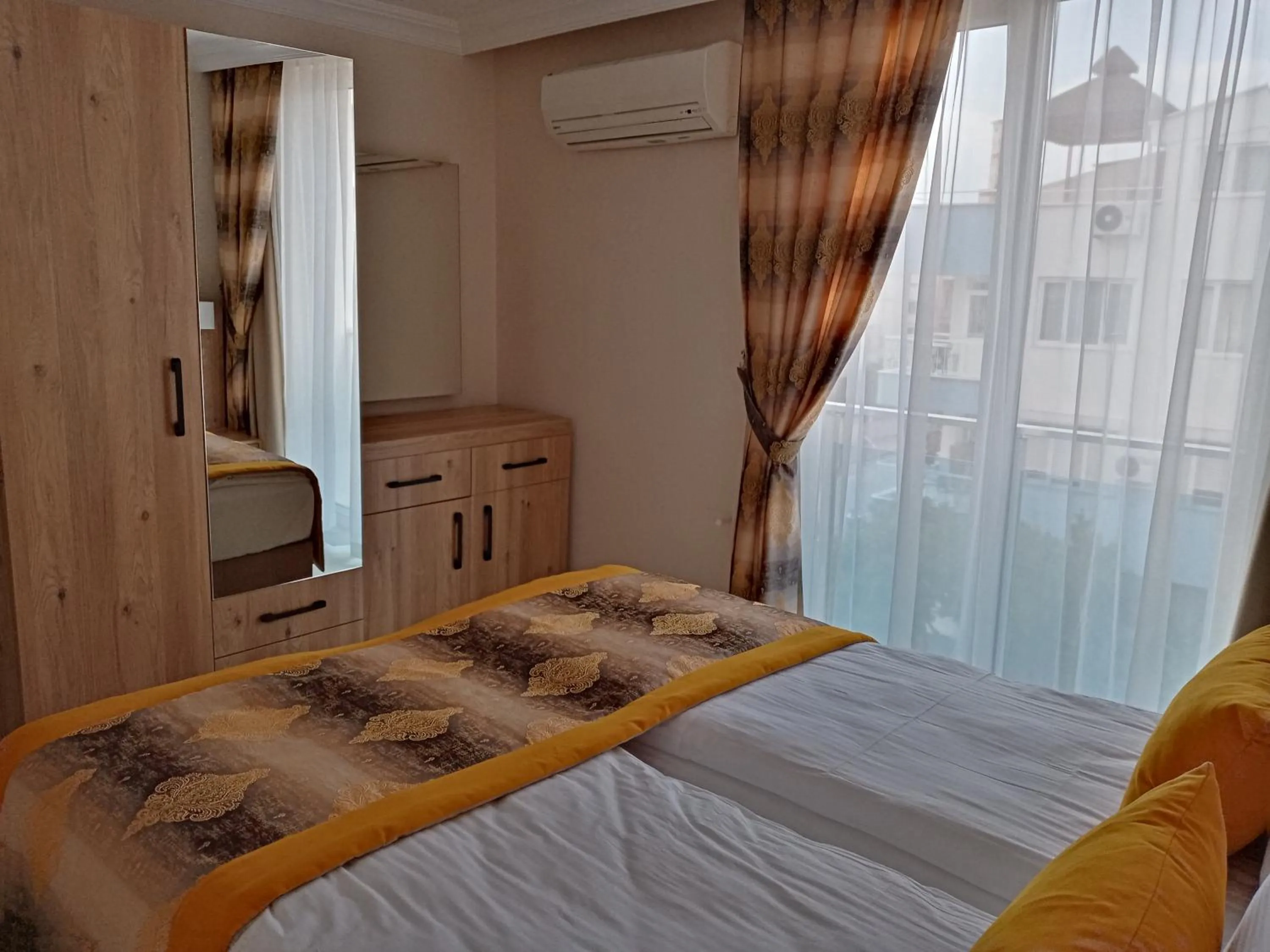 Bed in Alfa Apart Hotel