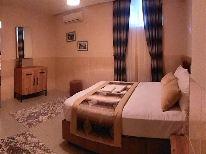 Bed in Alfa Apart Hotel