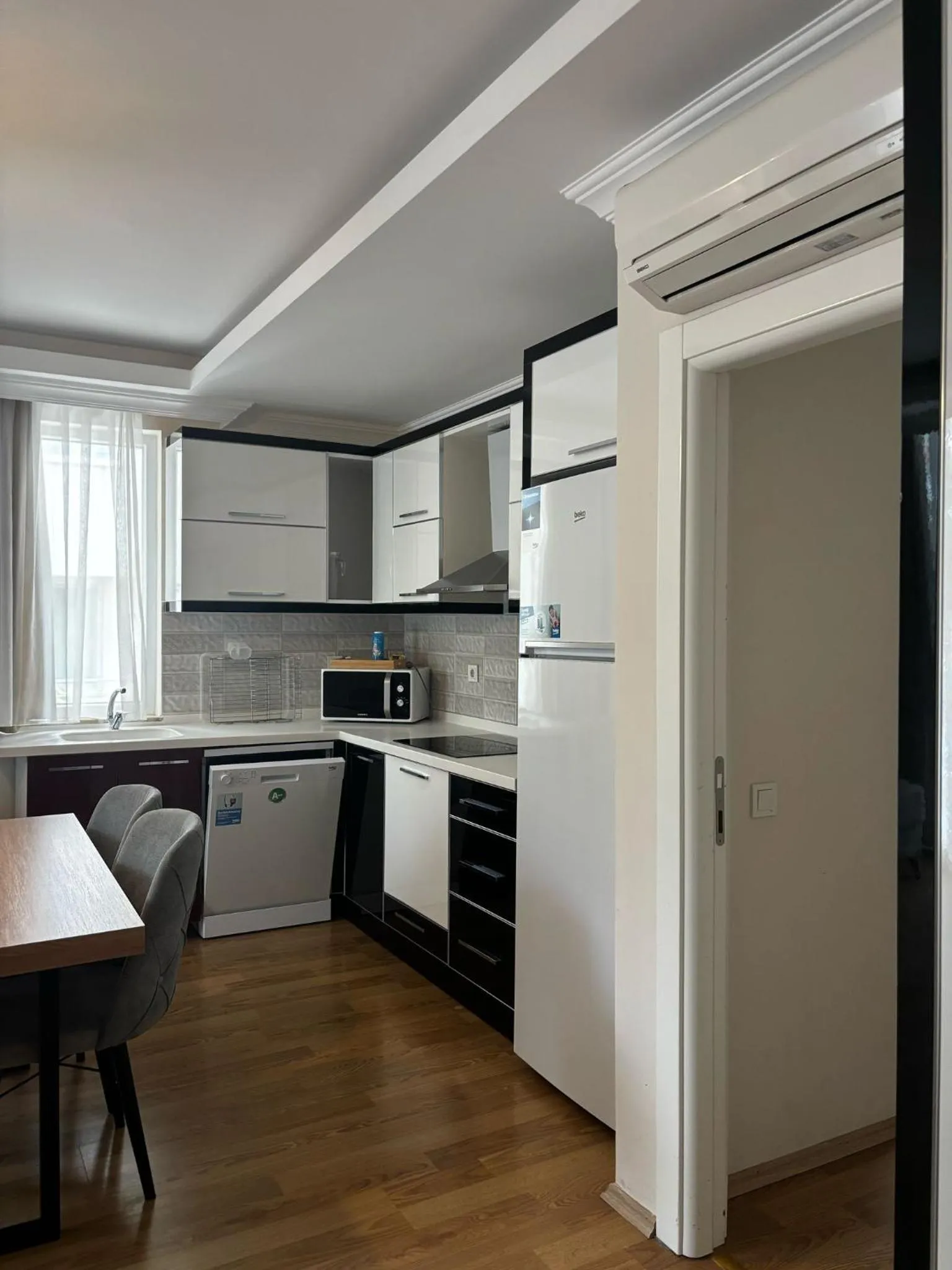 Kitchen or kitchenette in Alfa Apart Hotel
