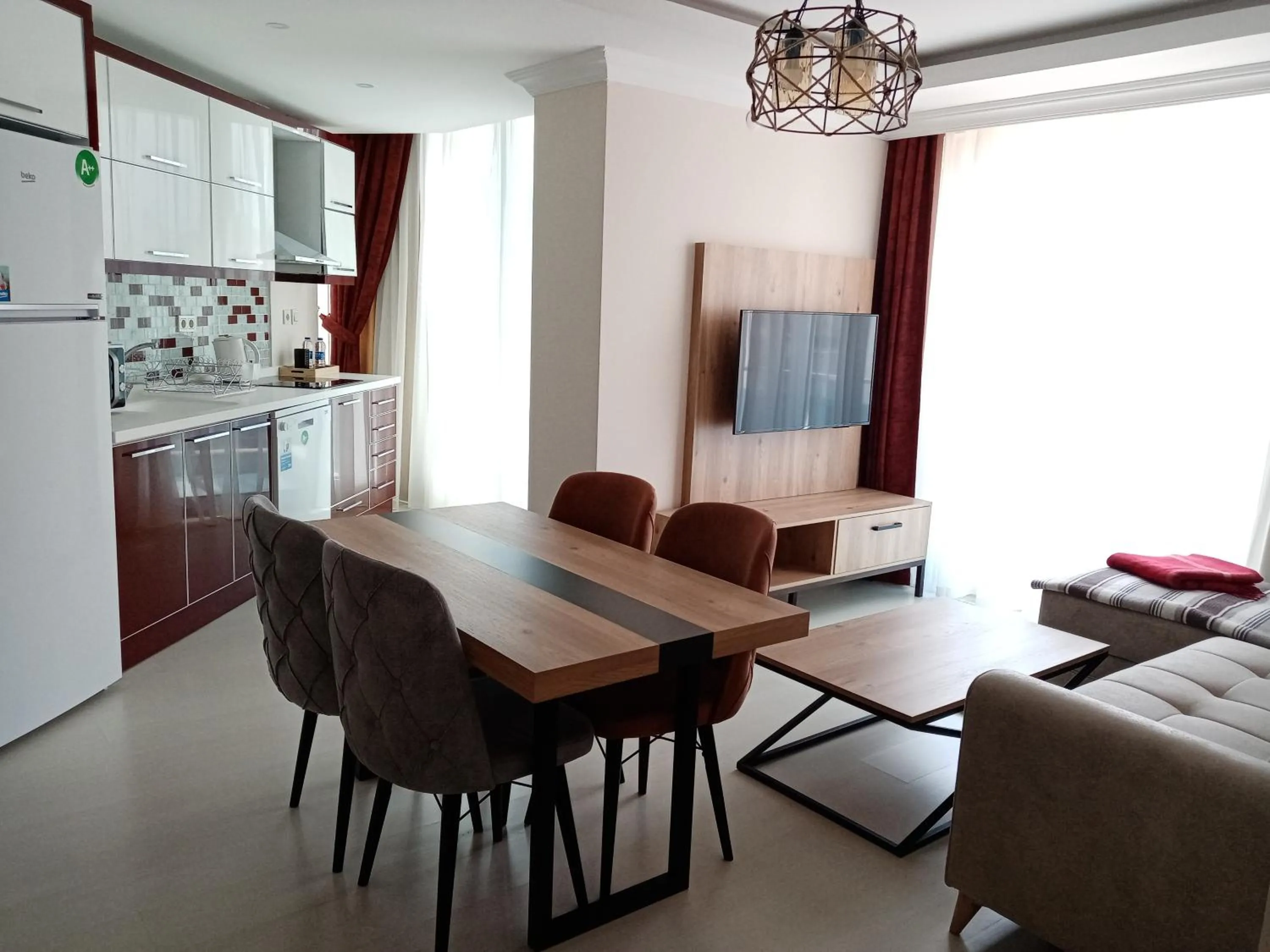 Kitchen or kitchenette in Alfa Apart Hotel