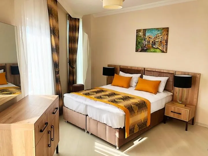 Bed in Alfa Apart Hotel