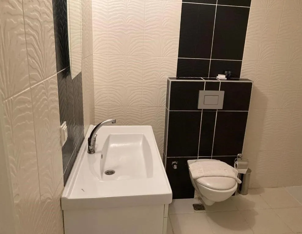 Bathroom in Alfa Apart Hotel