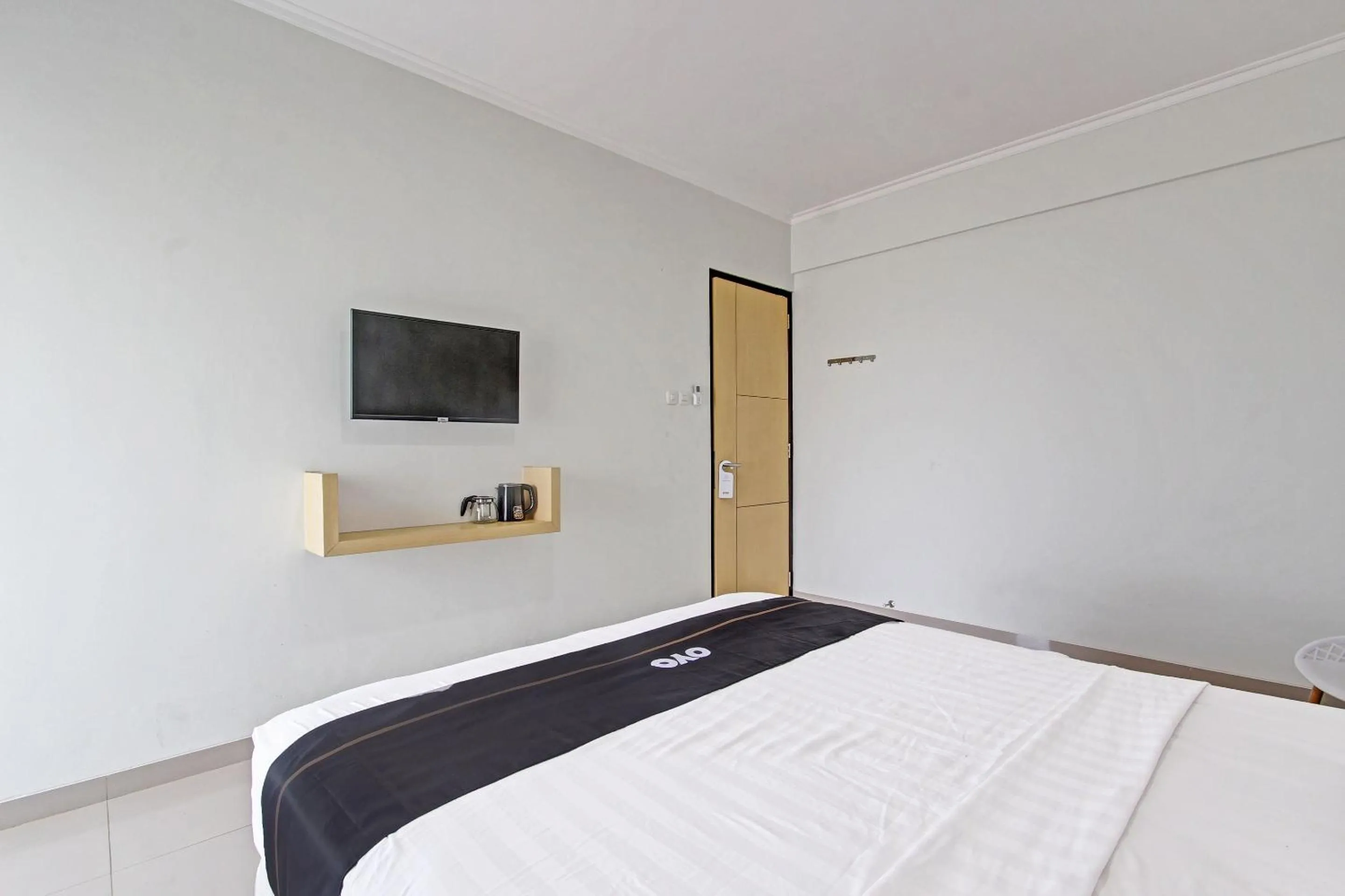 Bedroom in Capital O 91377 Mk Prime Syariah