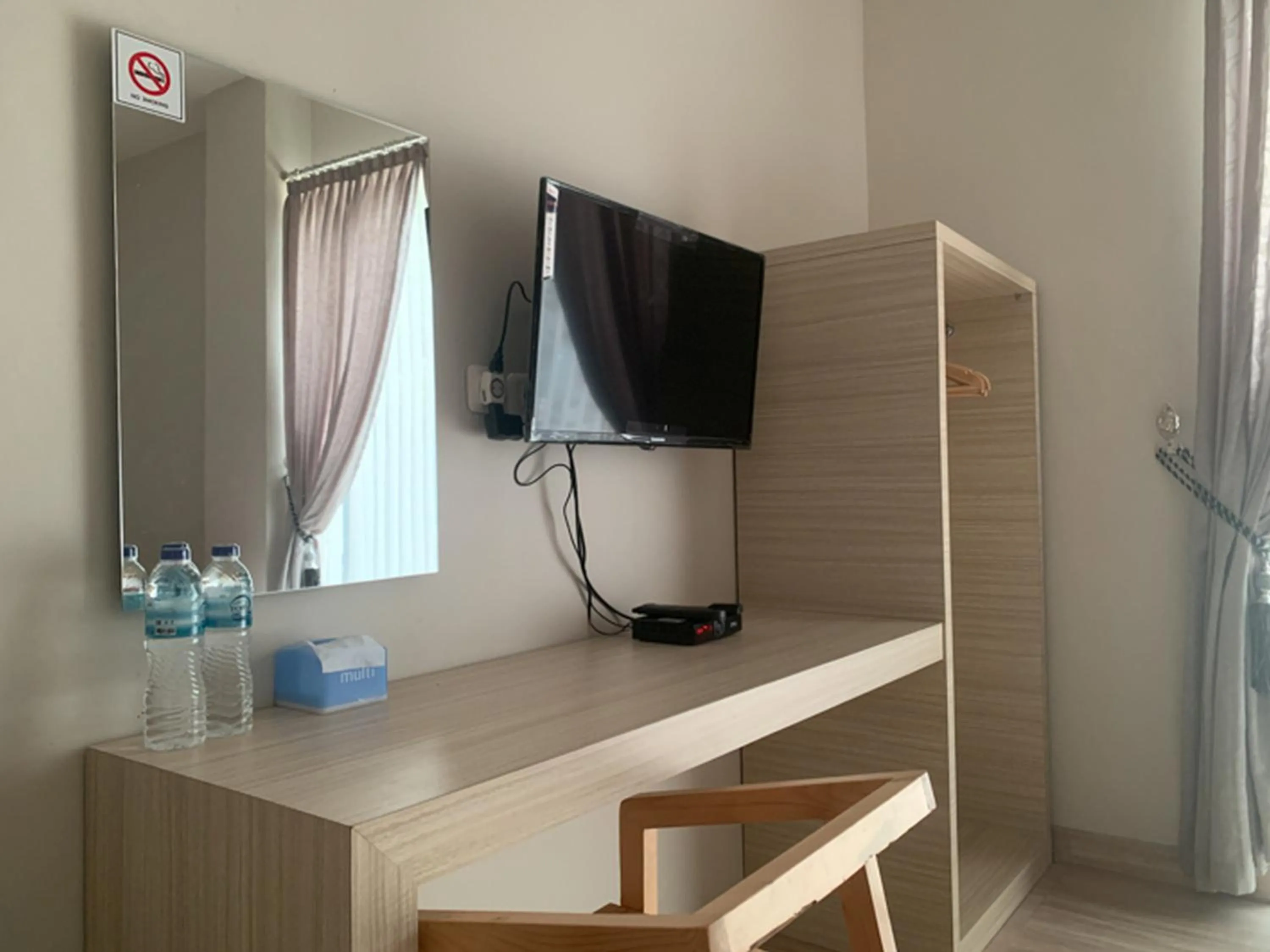 TV and multimedia in RedDoorz near Alun Alun Purbalingga