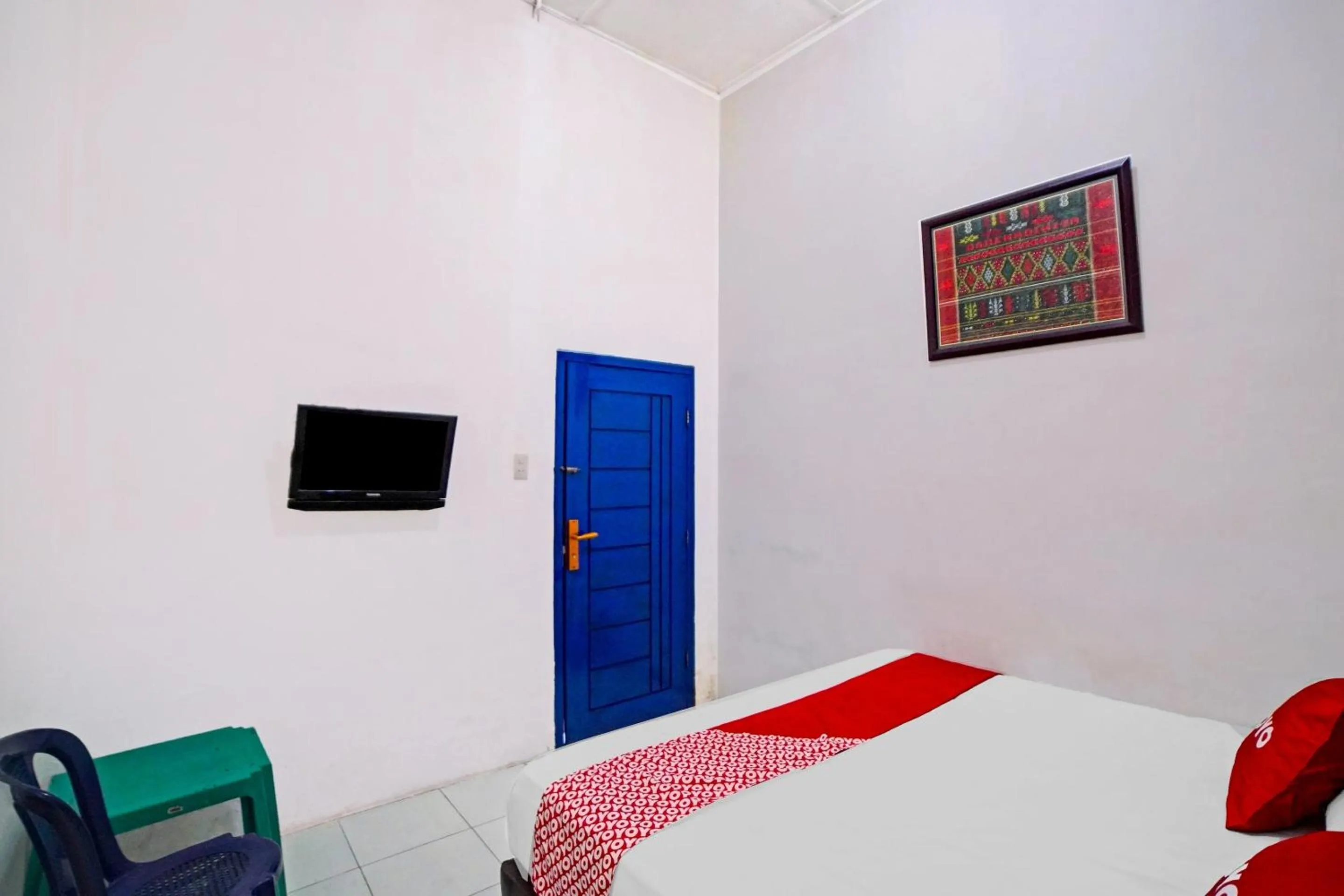 Bedroom in Hotel O Darussalam Inn