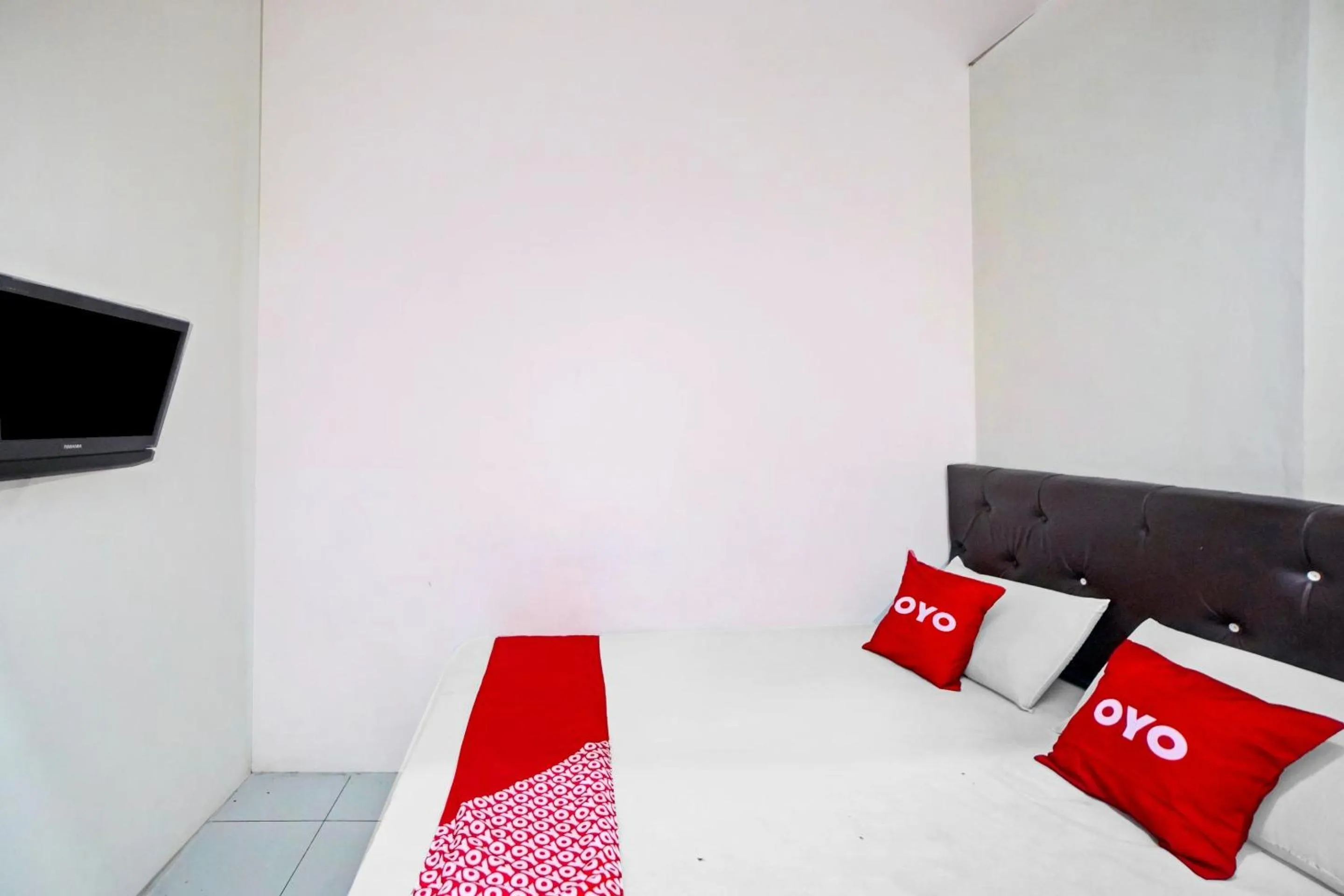 Bedroom in Hotel O Darussalam Inn