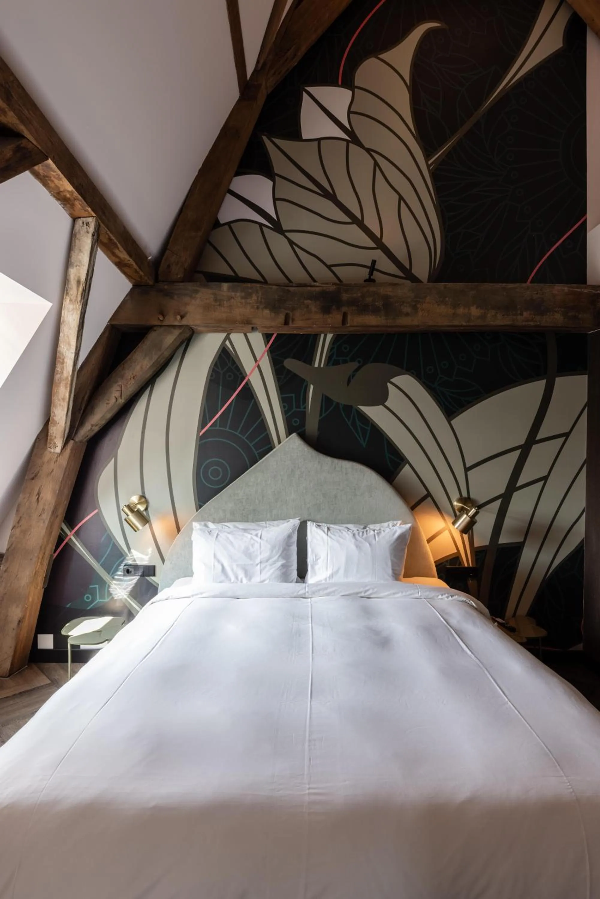 Bed in Relais & Châteaux Weeshuis Gouda