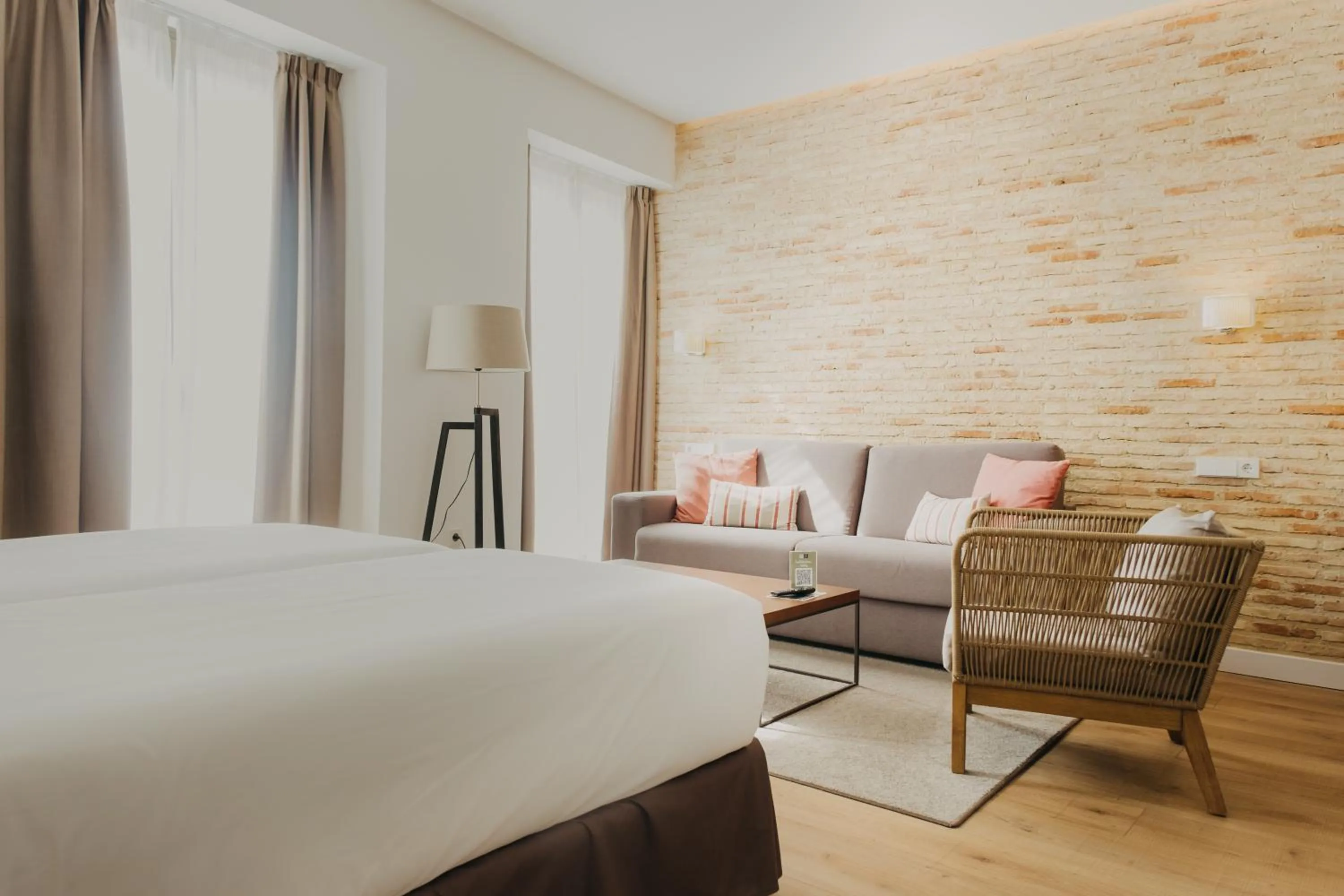 Bed in Aquitania Home Suites