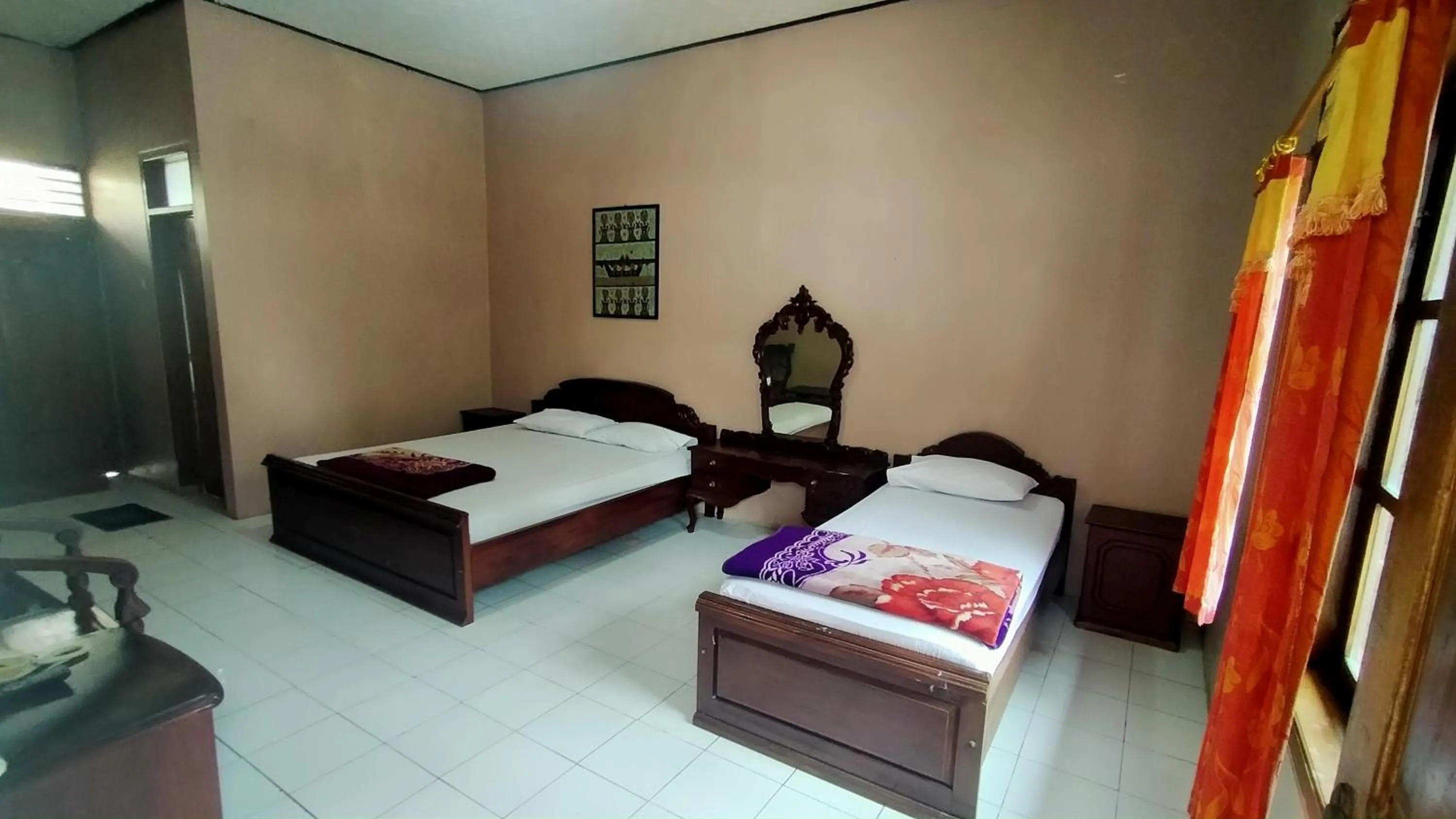 Bed in Hotel Garuda Syariah near Alun Alun Banjarnegara