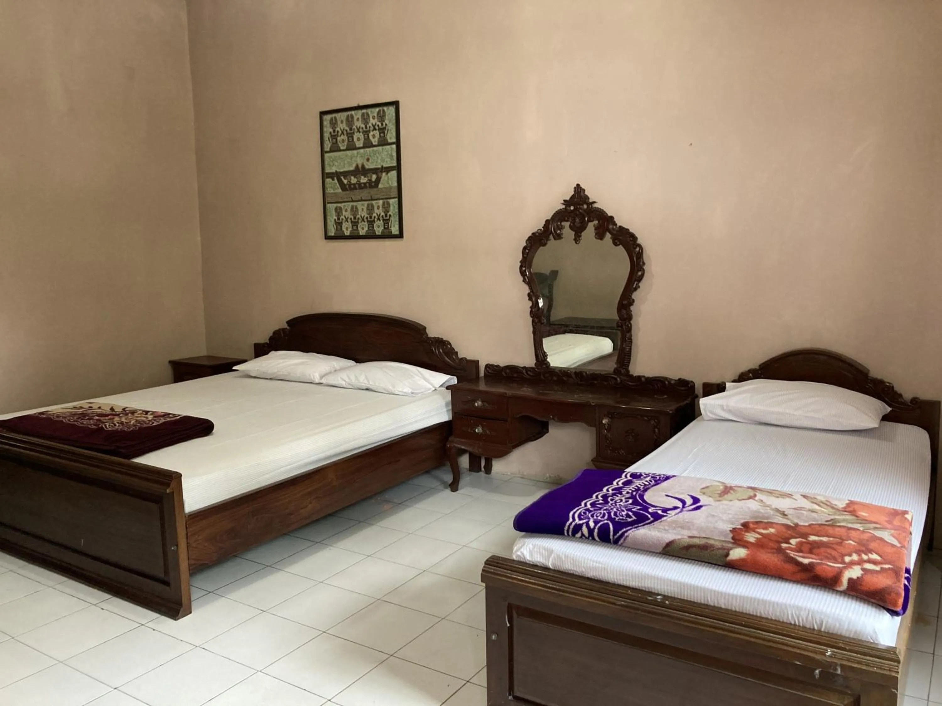 Bed in Hotel Garuda Syariah near Alun Alun Banjarnegara