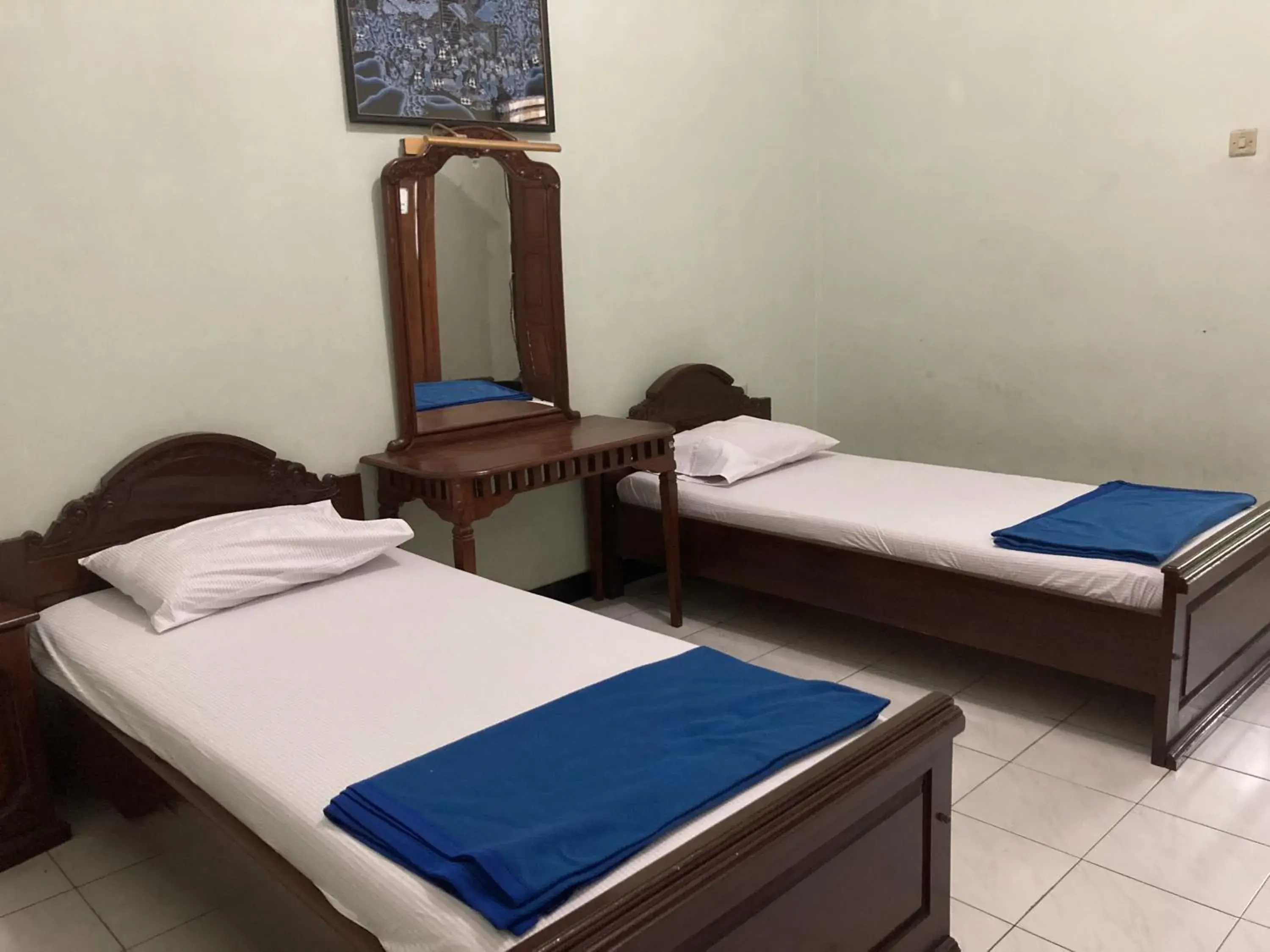 Superior Twin Room in Hotel Garuda Syariah near Alun Alun Banjarnegara Superior Twin Room in Hotel Garuda Syariah near Alun Alun Banjarnegara