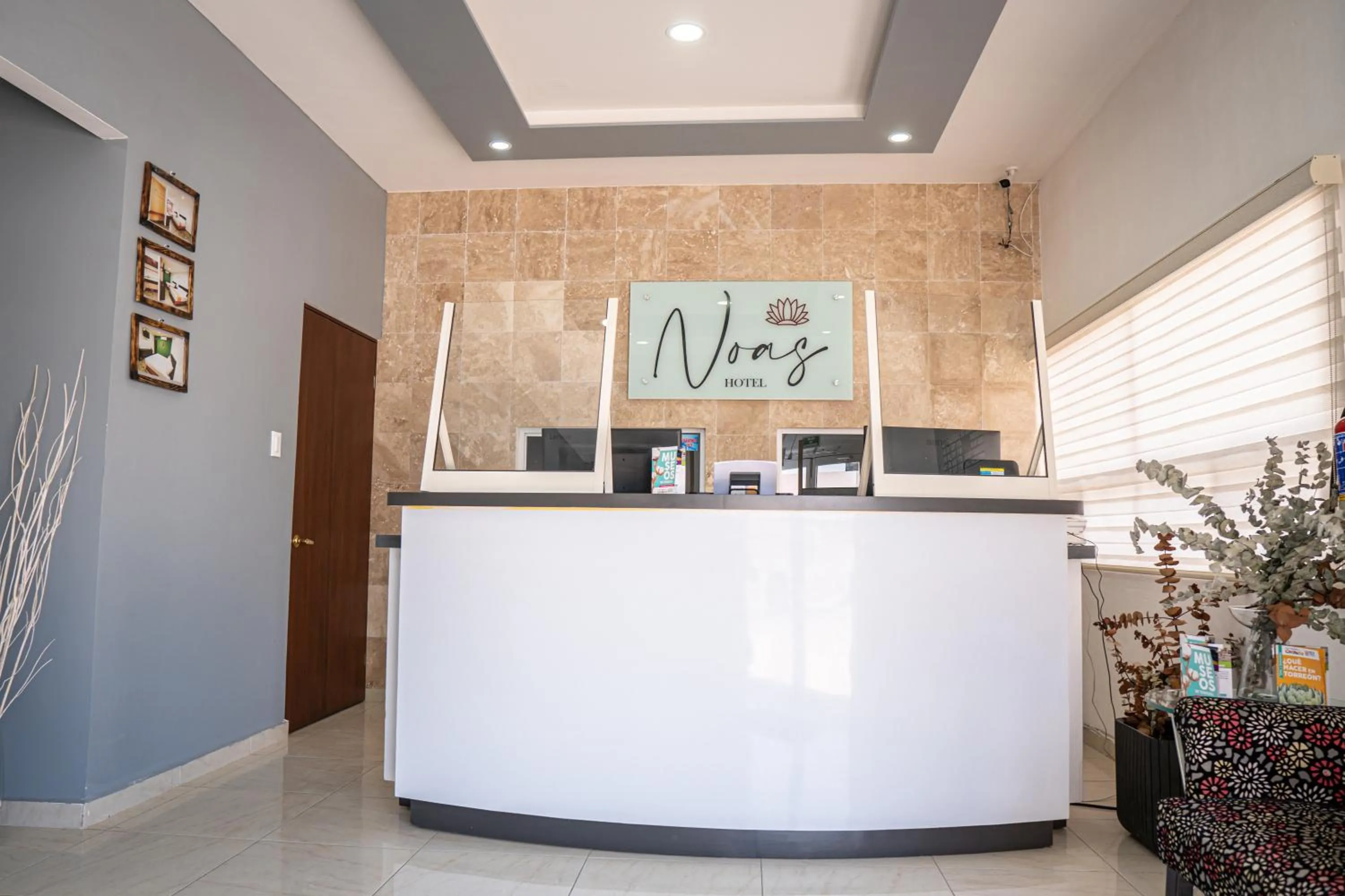Lobby or reception in Noas Hotel