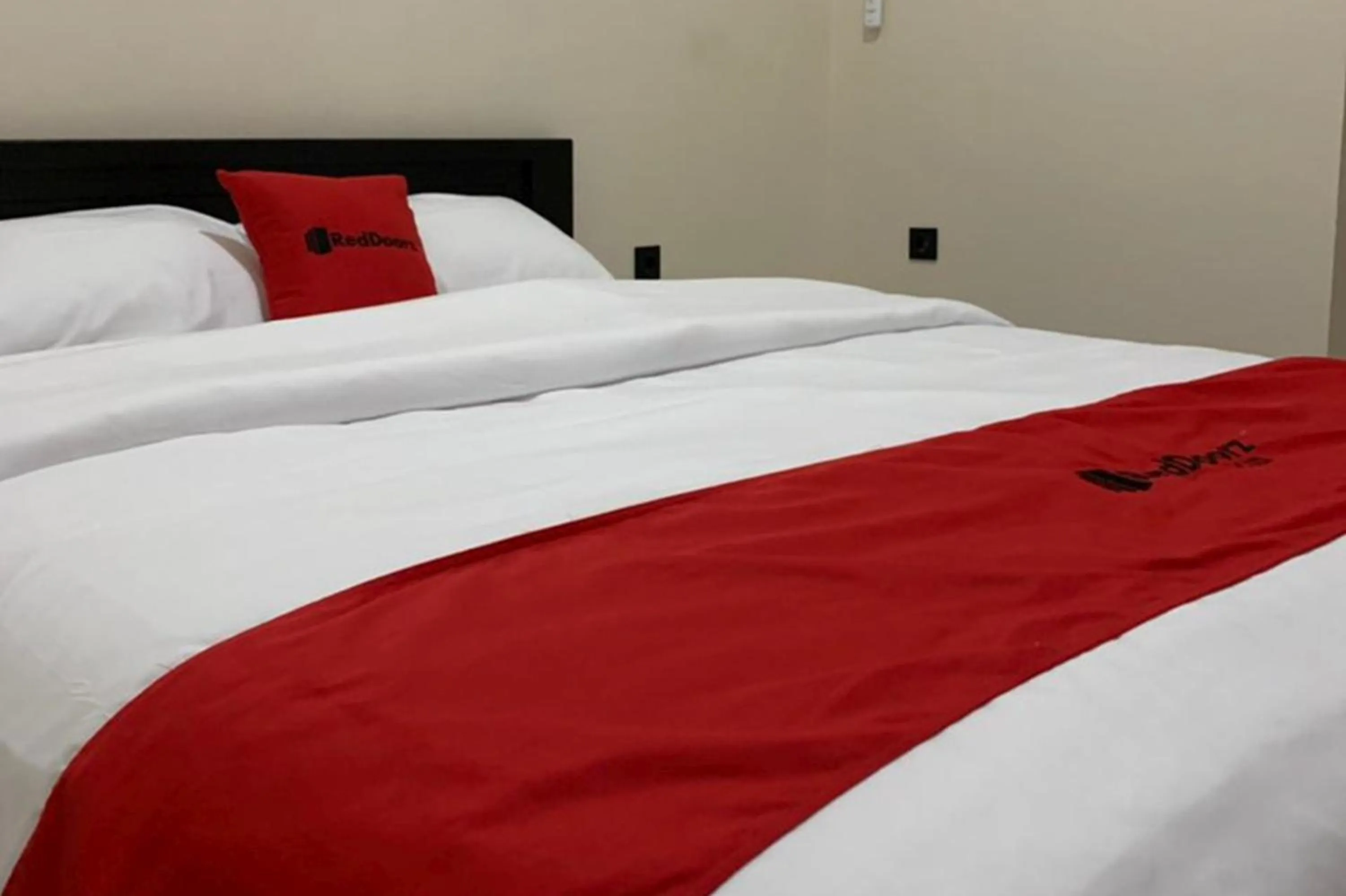 Bed in RedDoorz Syariah near Kawasan Simpang Lima Pati