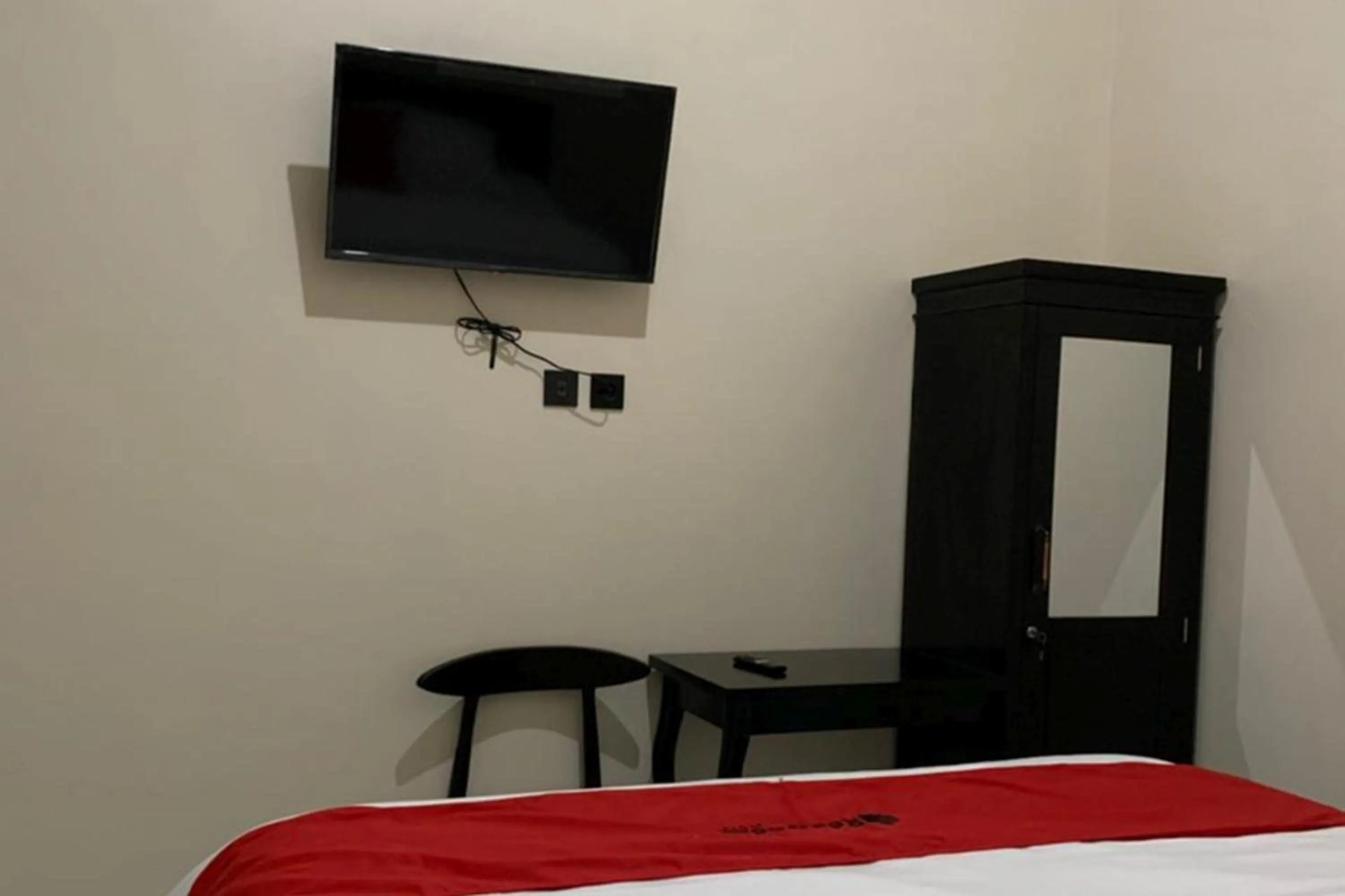 Bed in RedDoorz Syariah near Kawasan Simpang Lima Pati