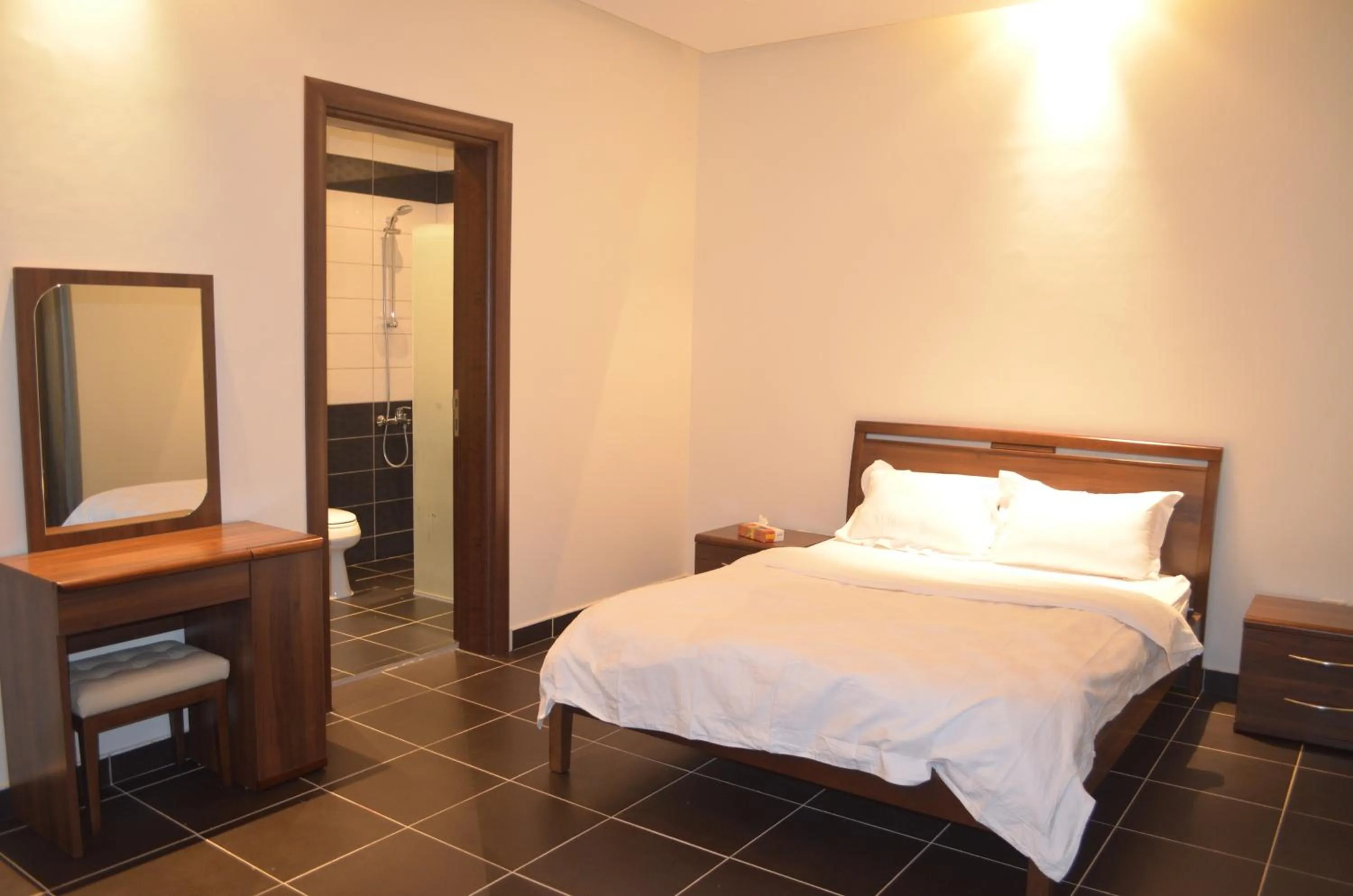 Bed in Al Juraisi Hotel Apartments