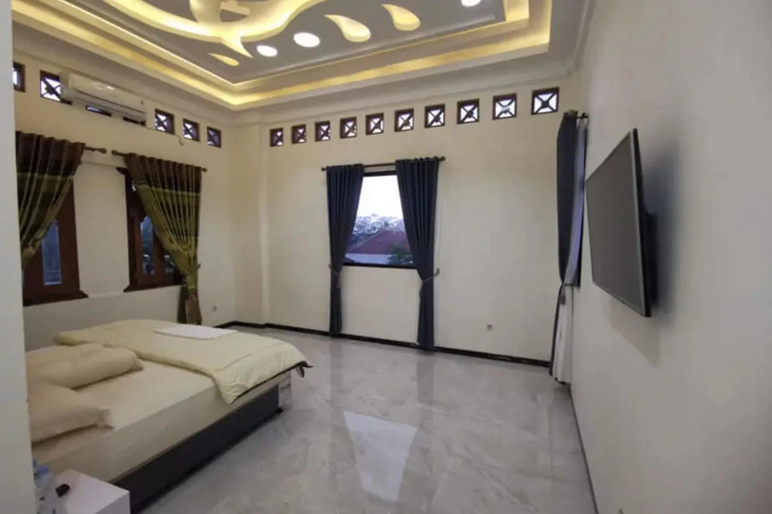 Bedroom, Bed in Griya Mataram Kotagede Mitra RedDoorz