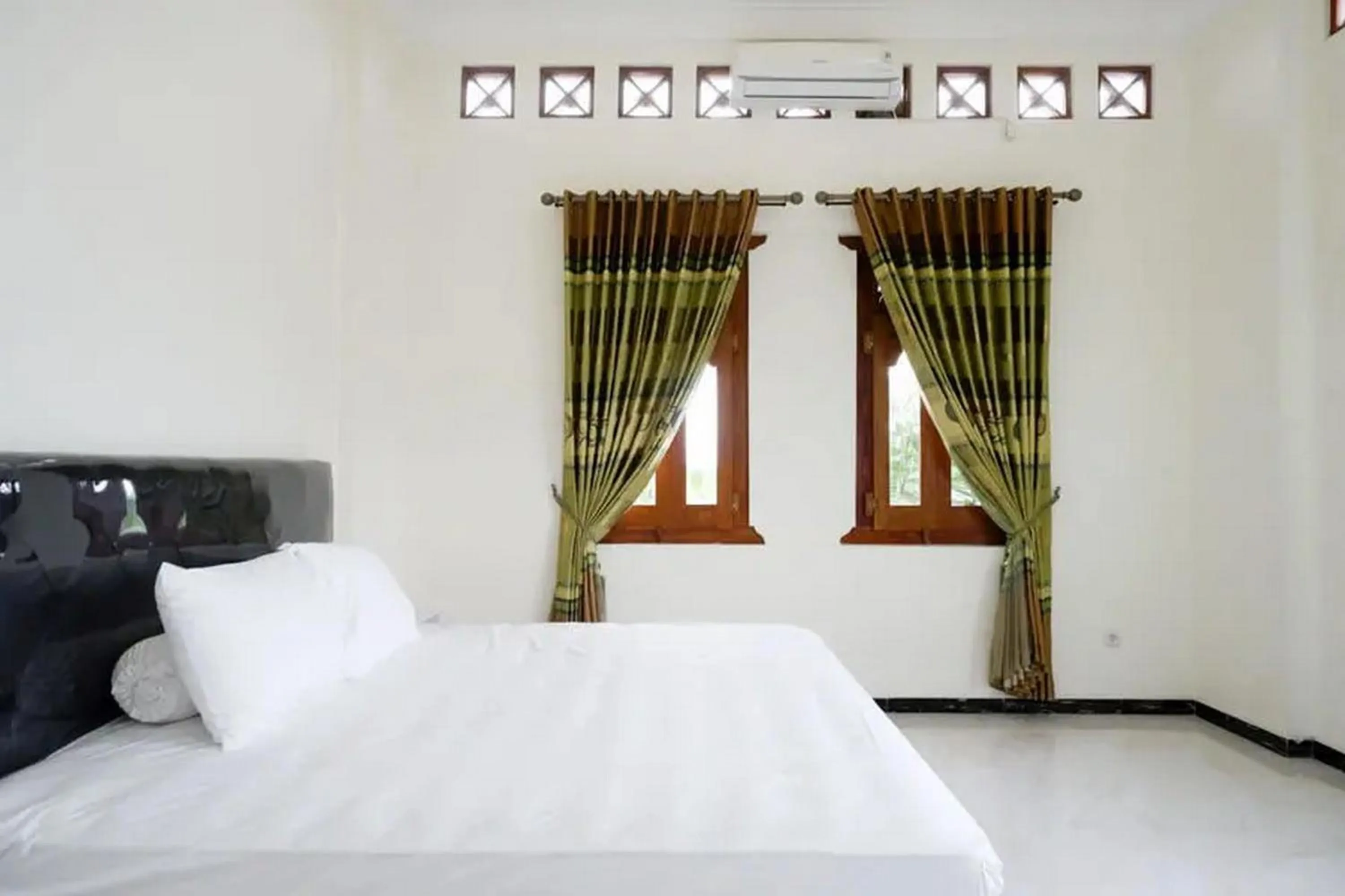 Bedroom, Bed in Griya Mataram Kotagede Mitra RedDoorz