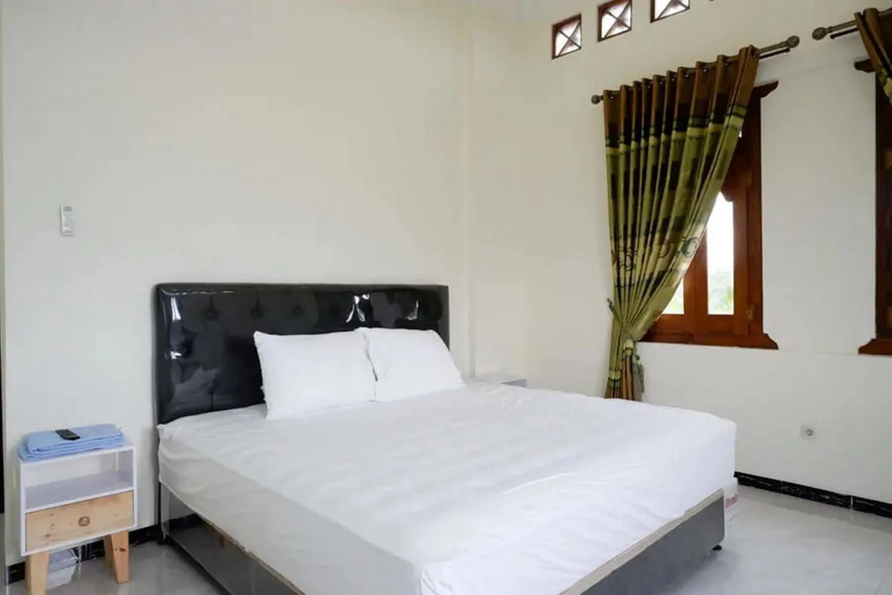 Bedroom, Bed in Griya Mataram Kotagede Mitra RedDoorz