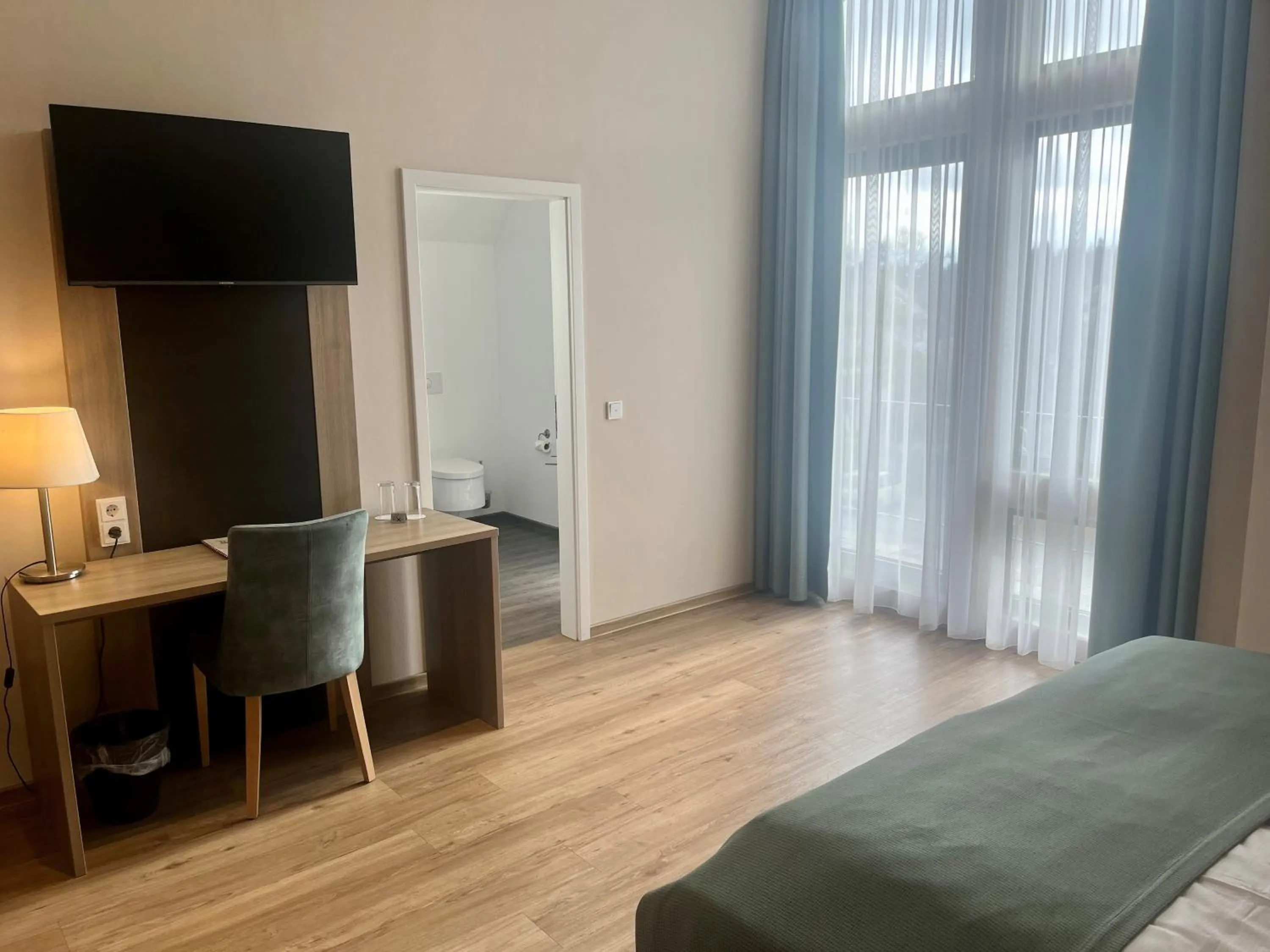 Bed in Troll's Brauhaushotel