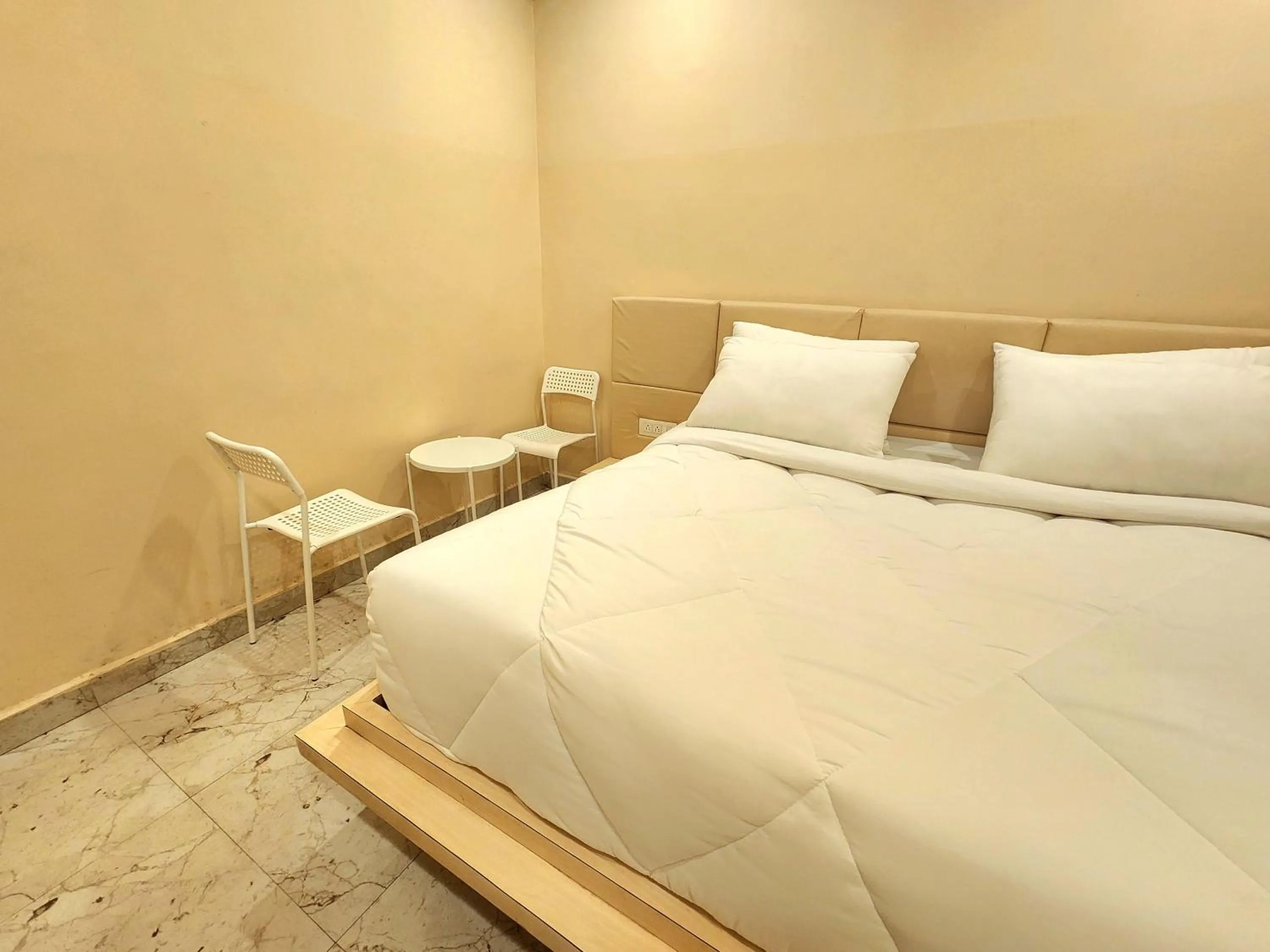 Bedroom, Bed in Landcorp hotels