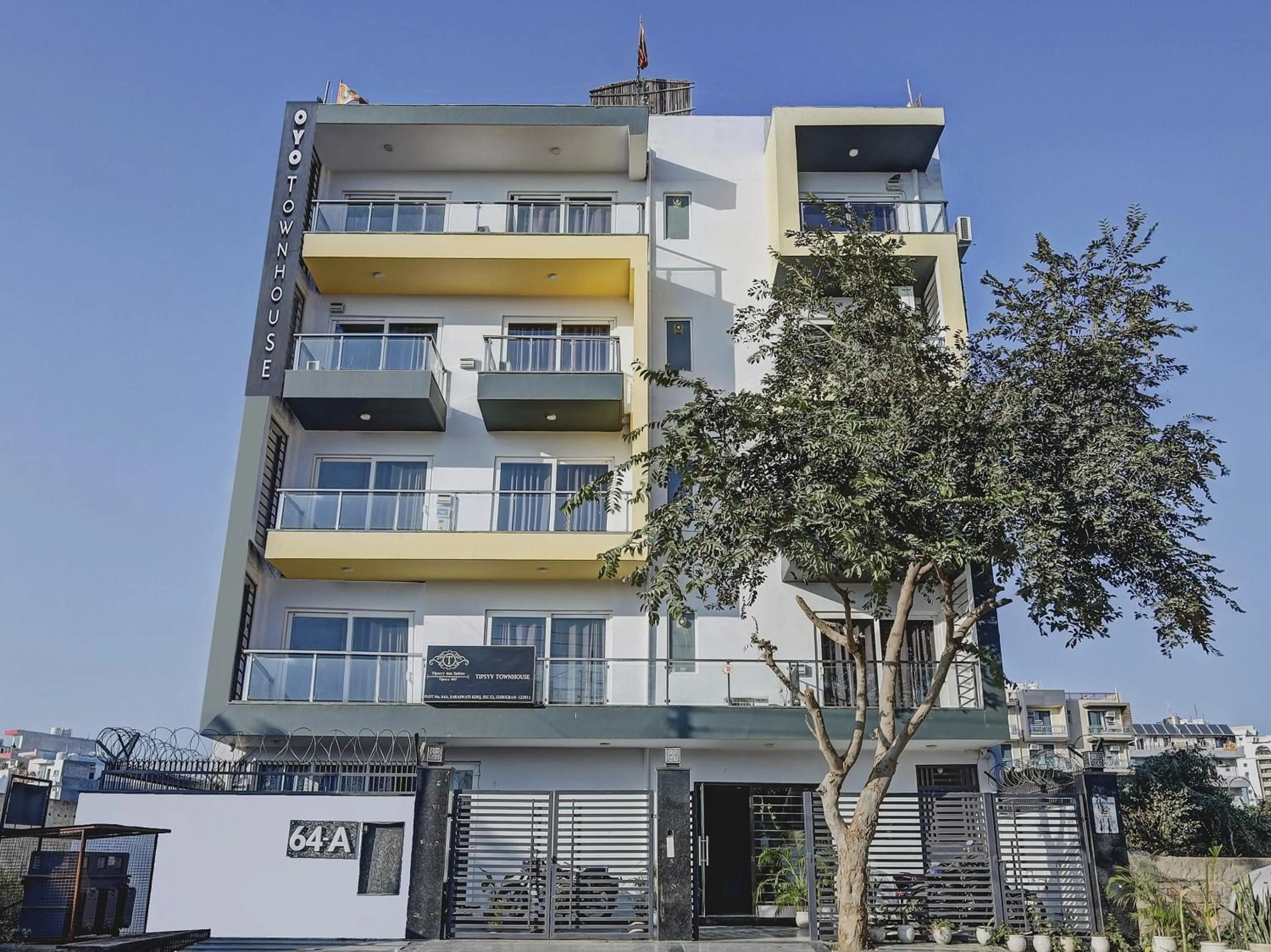 Facade/entrance in Super Townhouse Tipsyy Near Bestech Central Square Mall
