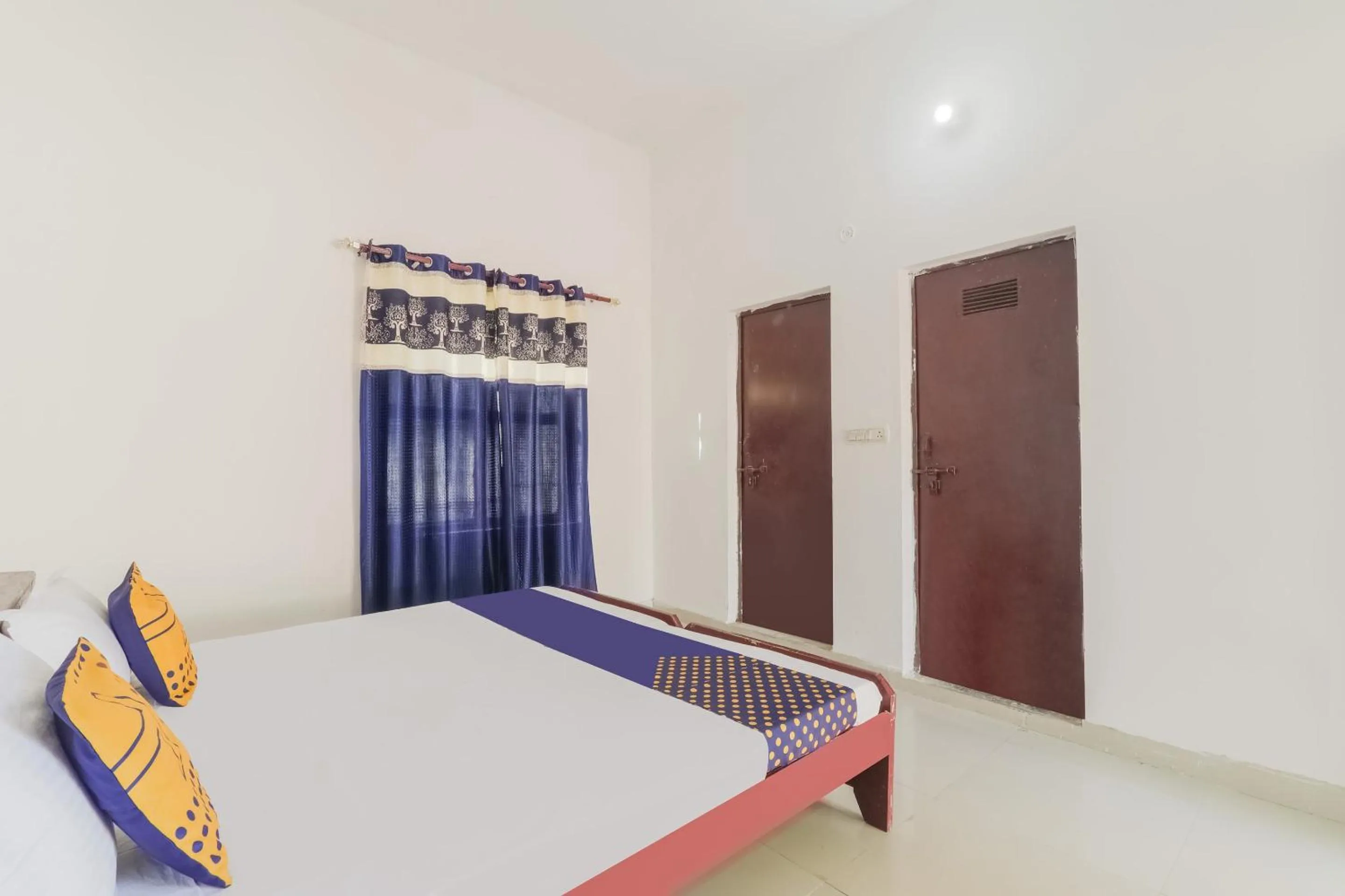 Bedroom in SPOT ON Sahyadri Inn