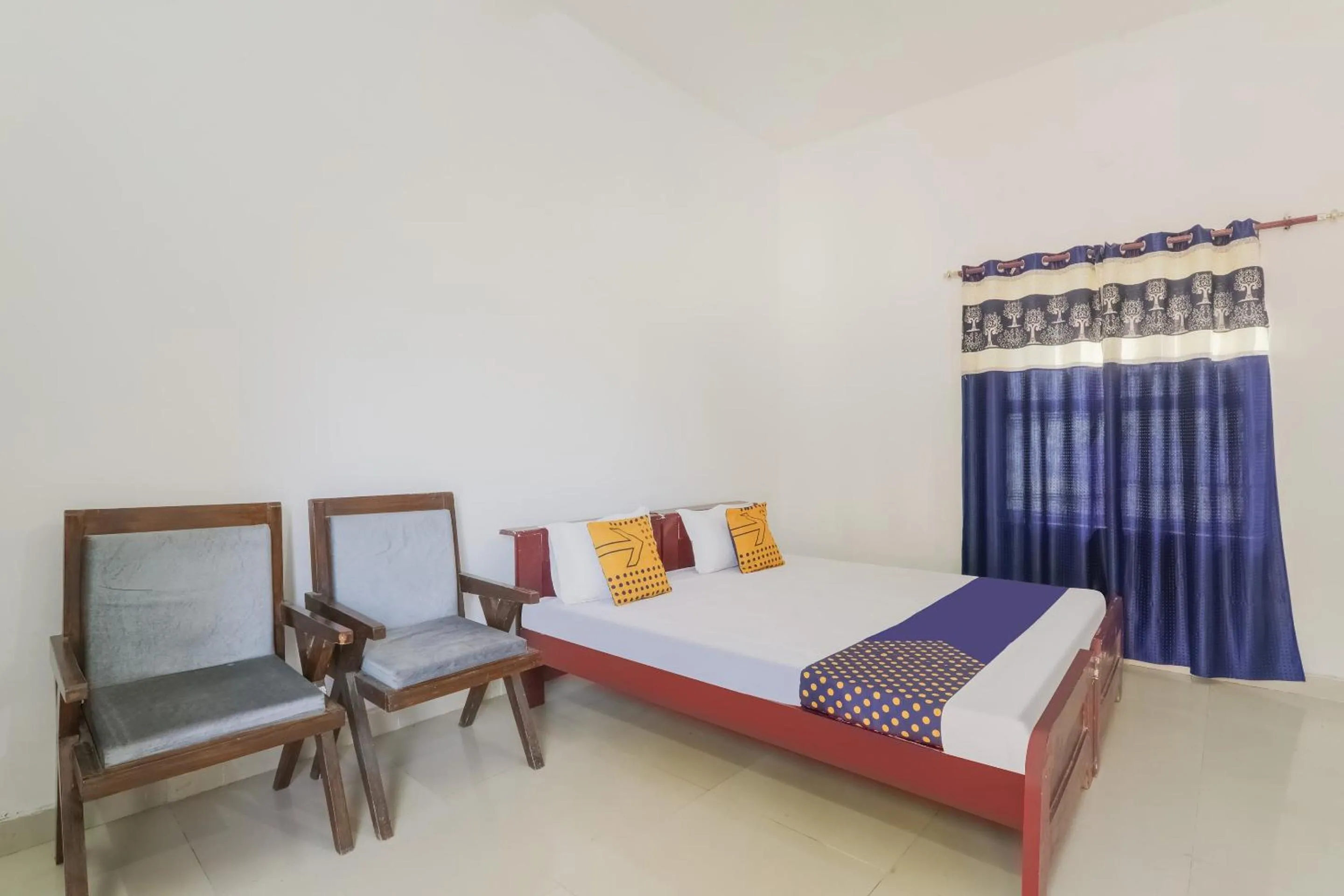 Bedroom in SPOT ON Sahyadri Inn