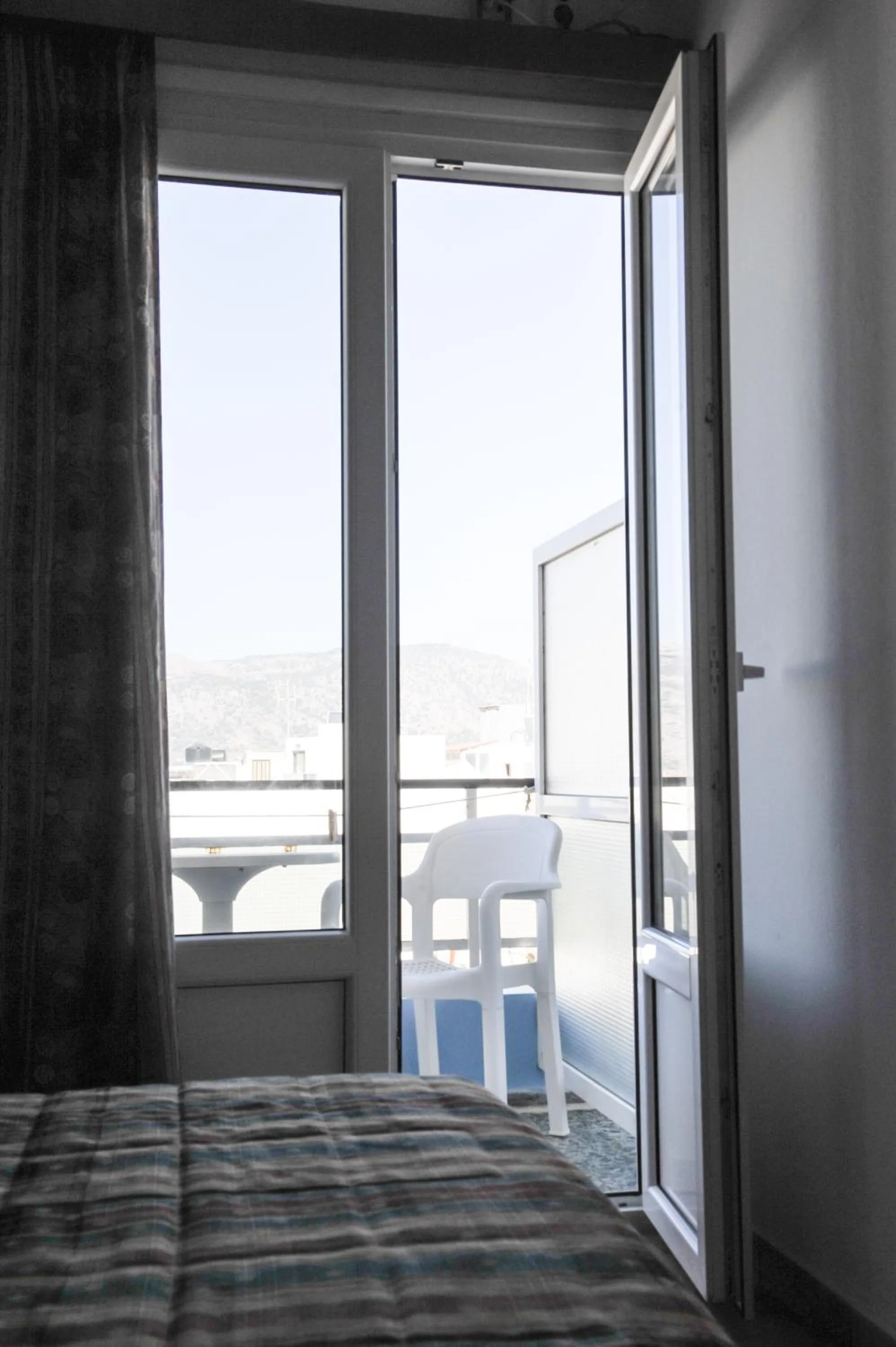 Balcony/Terrace, Bed in Hotel Karpathos