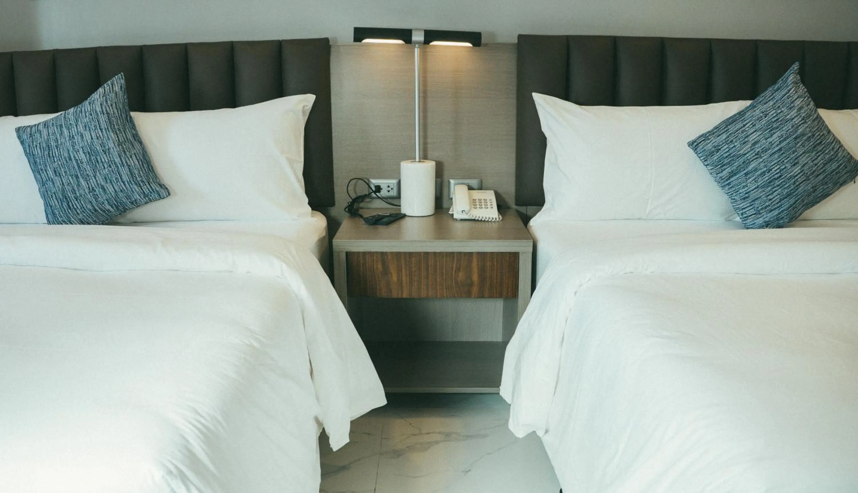 Bed in NS Royal Hotel