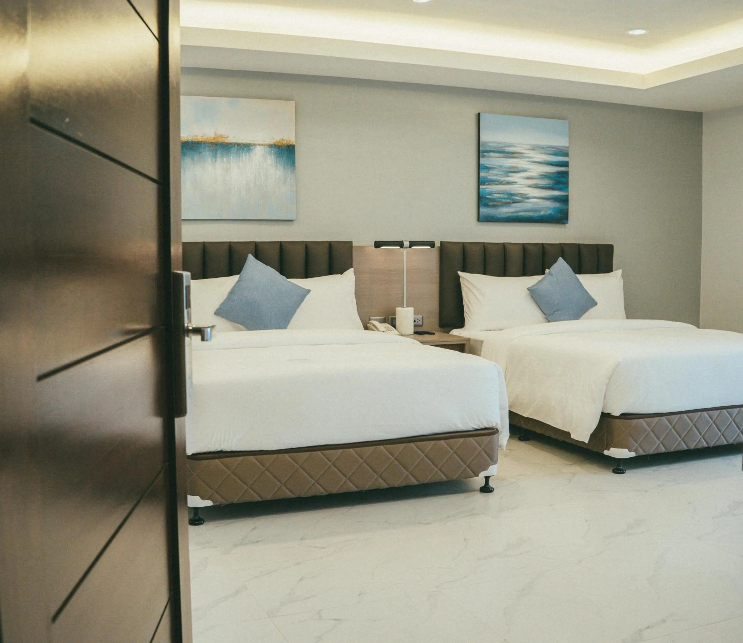 Bed in NS Royal Hotel