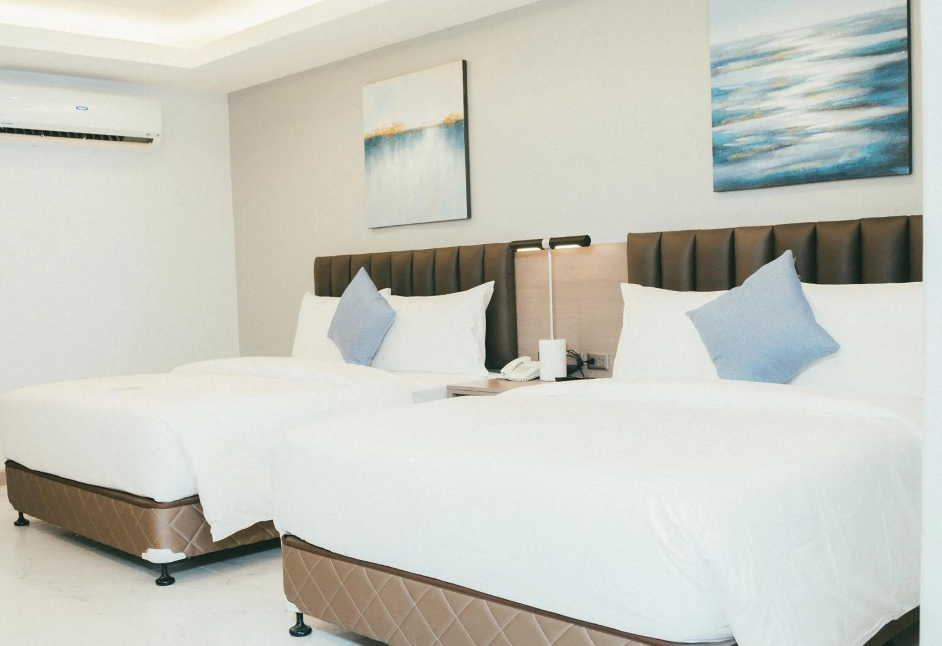 Bed in NS Royal Hotel