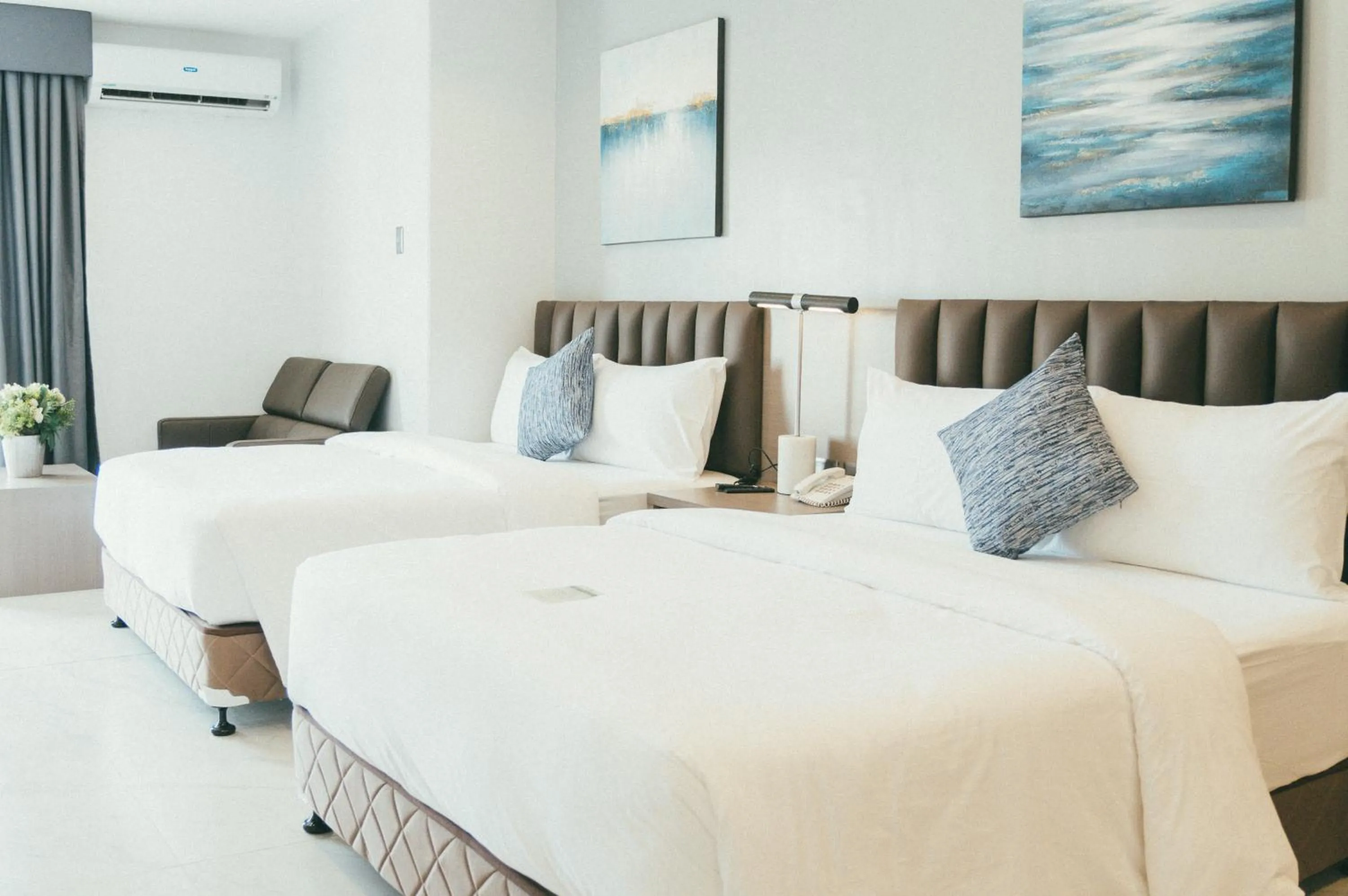 Bed in NS Royal Hotel