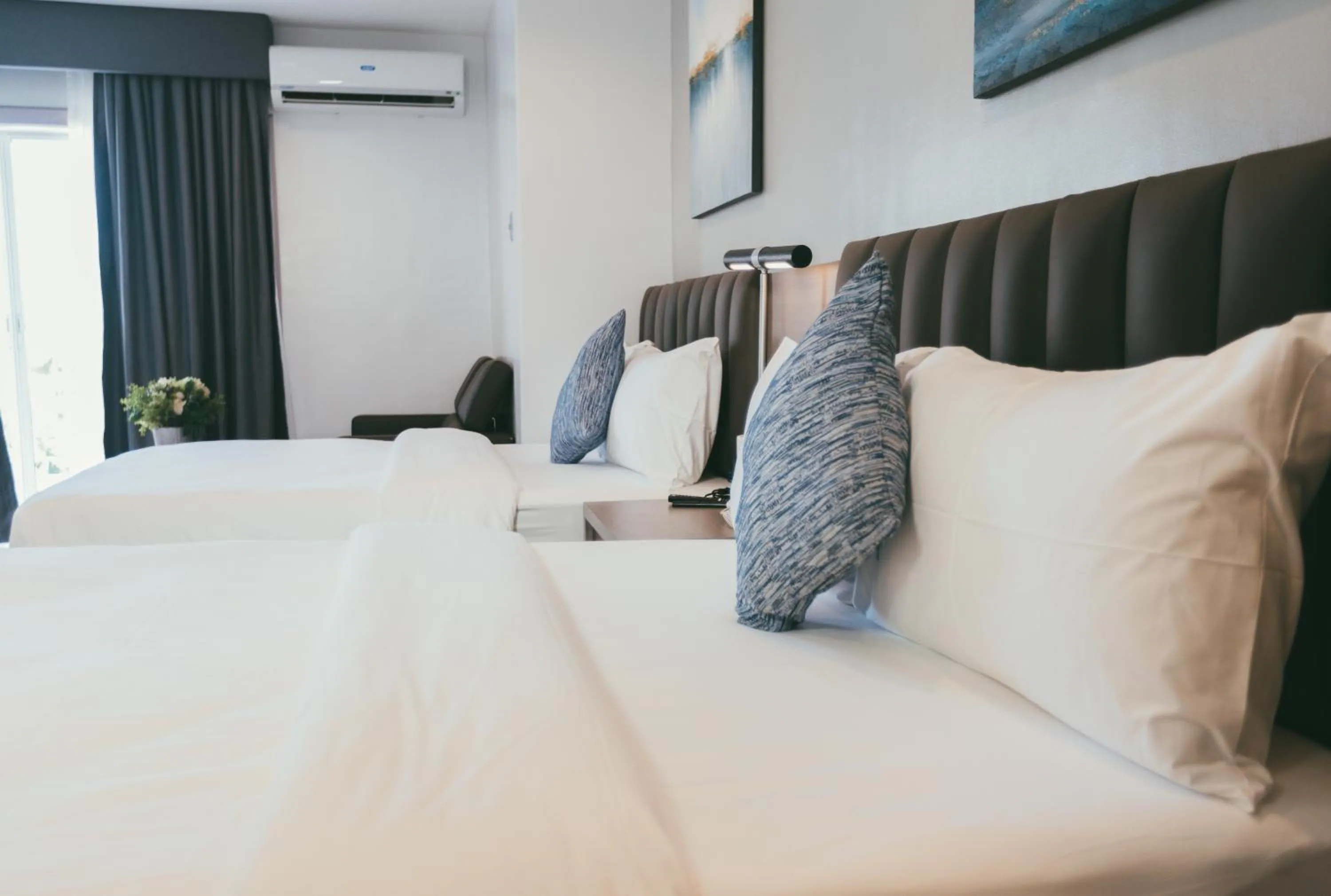 Bed in NS Royal Hotel