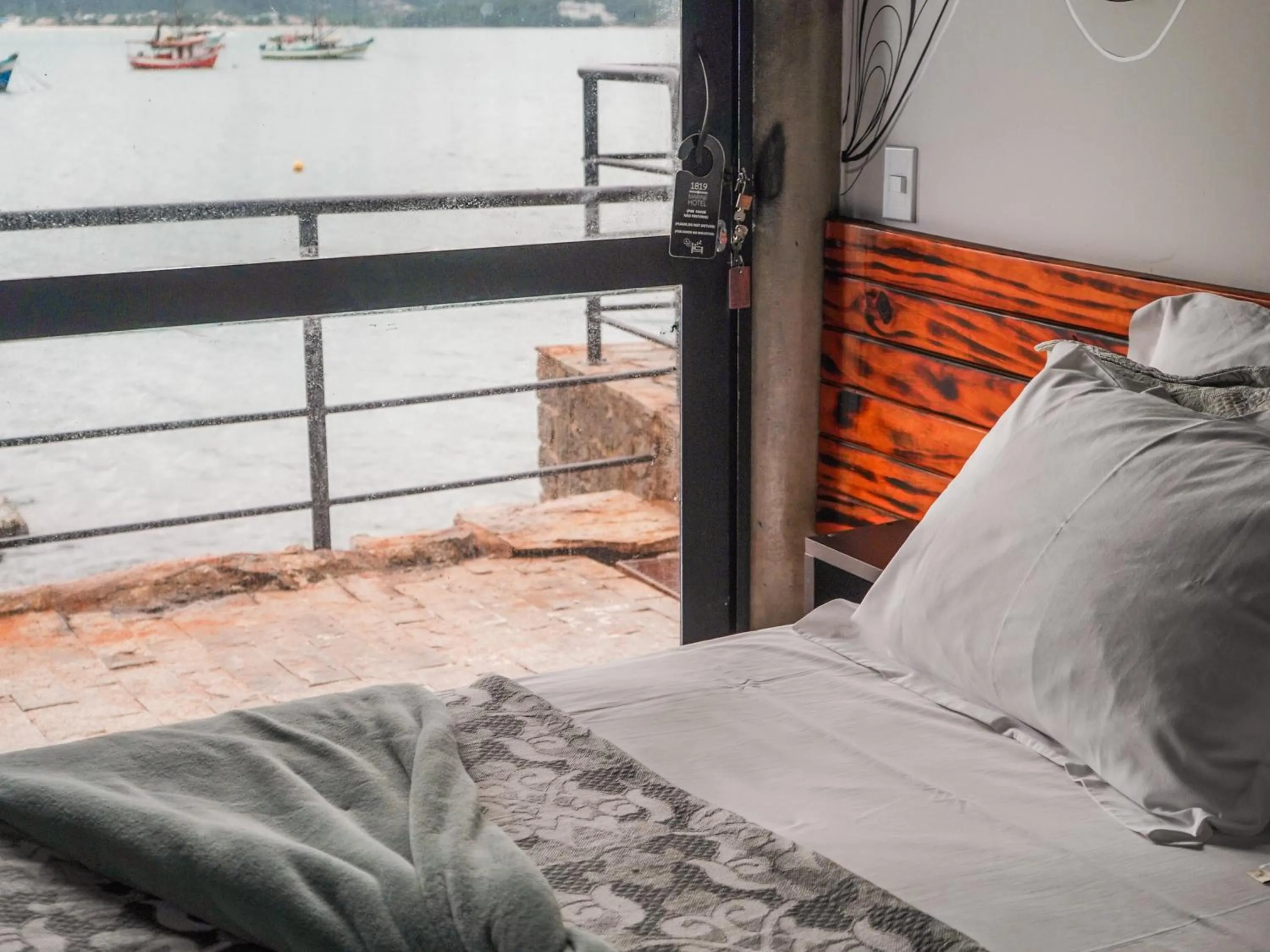 Bed in 1819 Marine Hotel